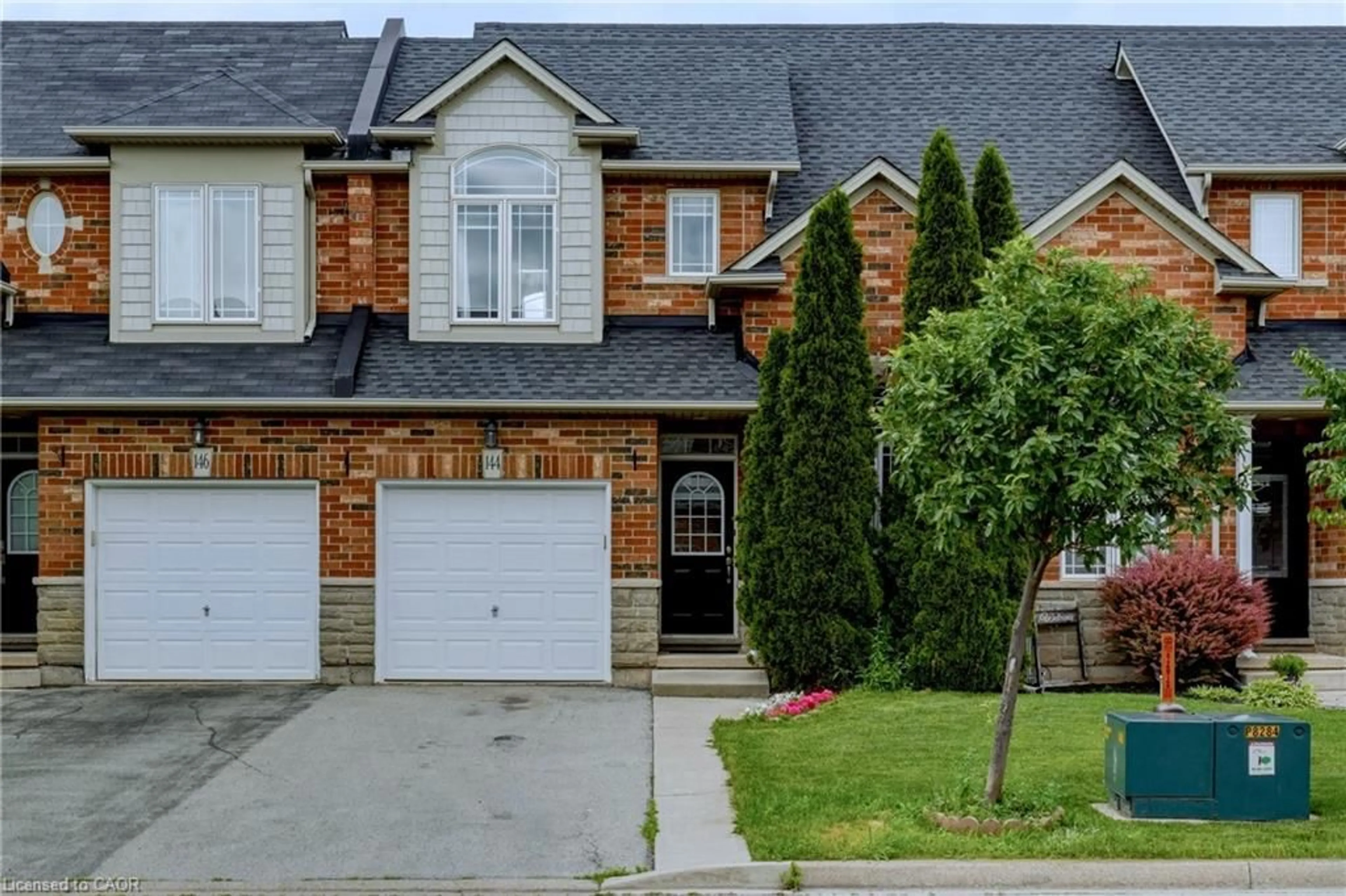 Home with brick exterior material, street for 144 Benziger Lane, Stoney Creek Ontario L8E 6G6