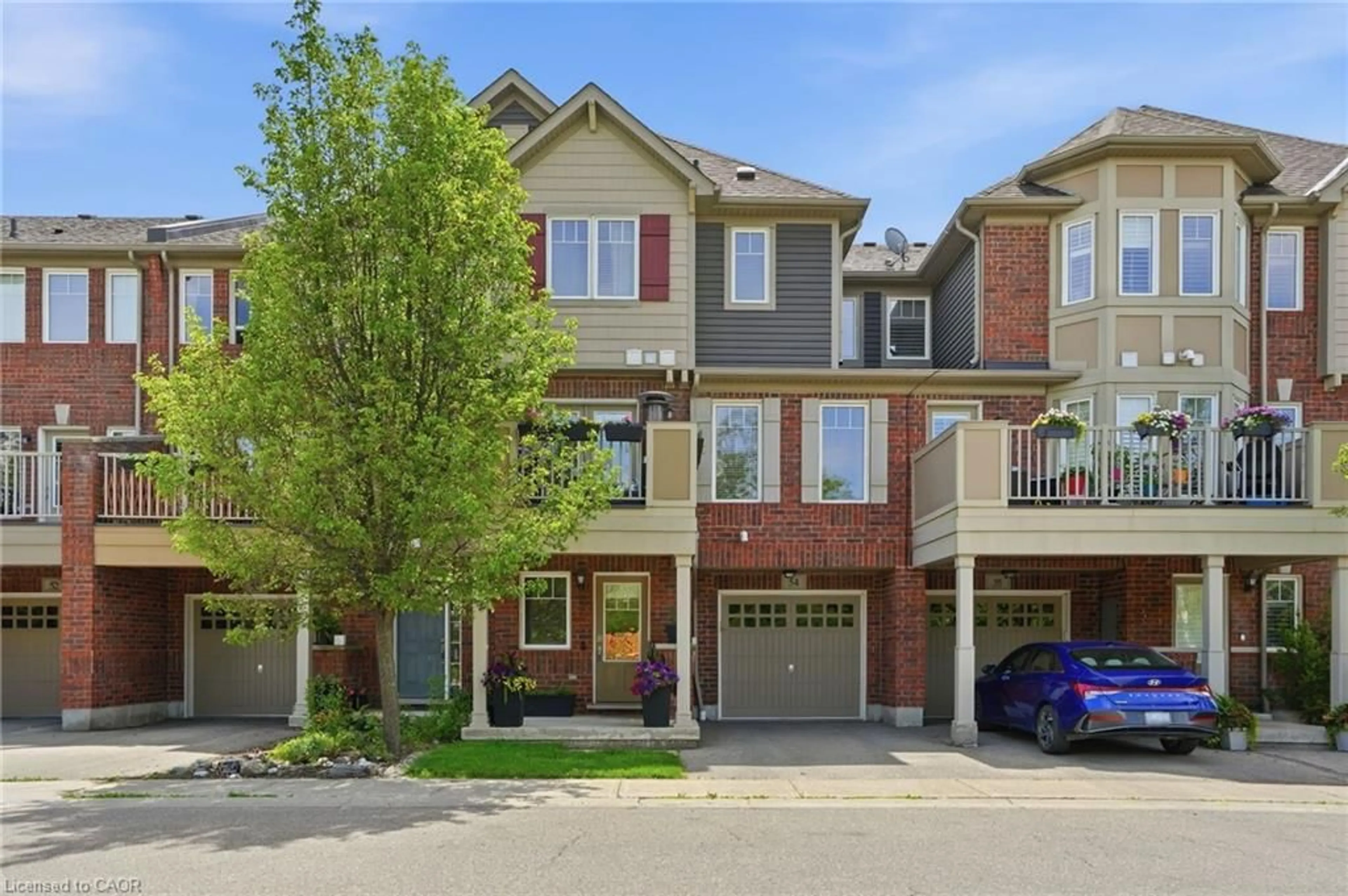 Home with brick exterior material, street for 3050 Rotary Way #54, Burlington Ontario L7M 0G8