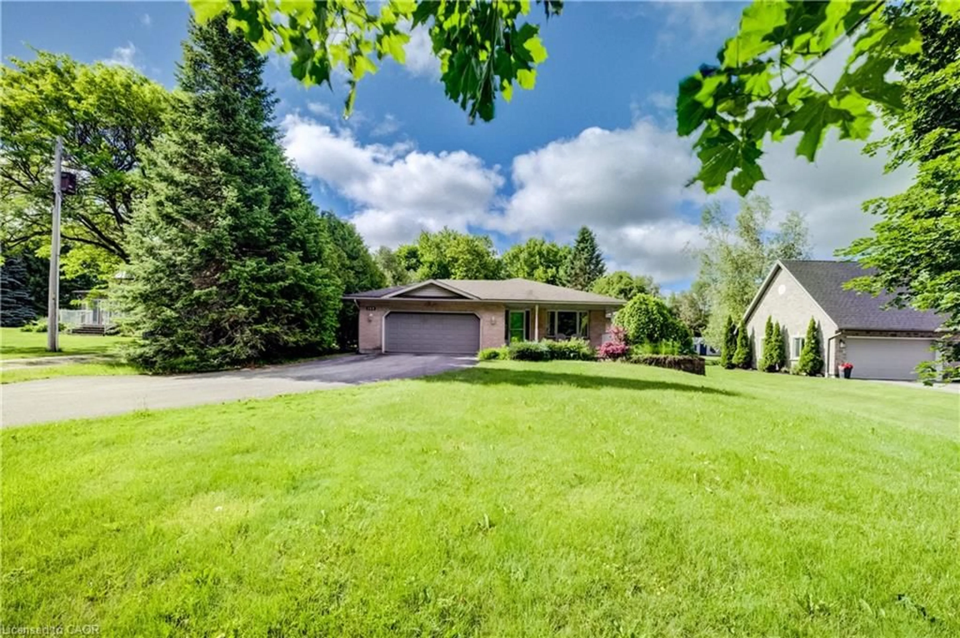 A pic from outside/outdoor area/front of a property/back of a property/a pic from drone, unknown for 144 South Water St, Mount Forest Ontario N0G 2L3