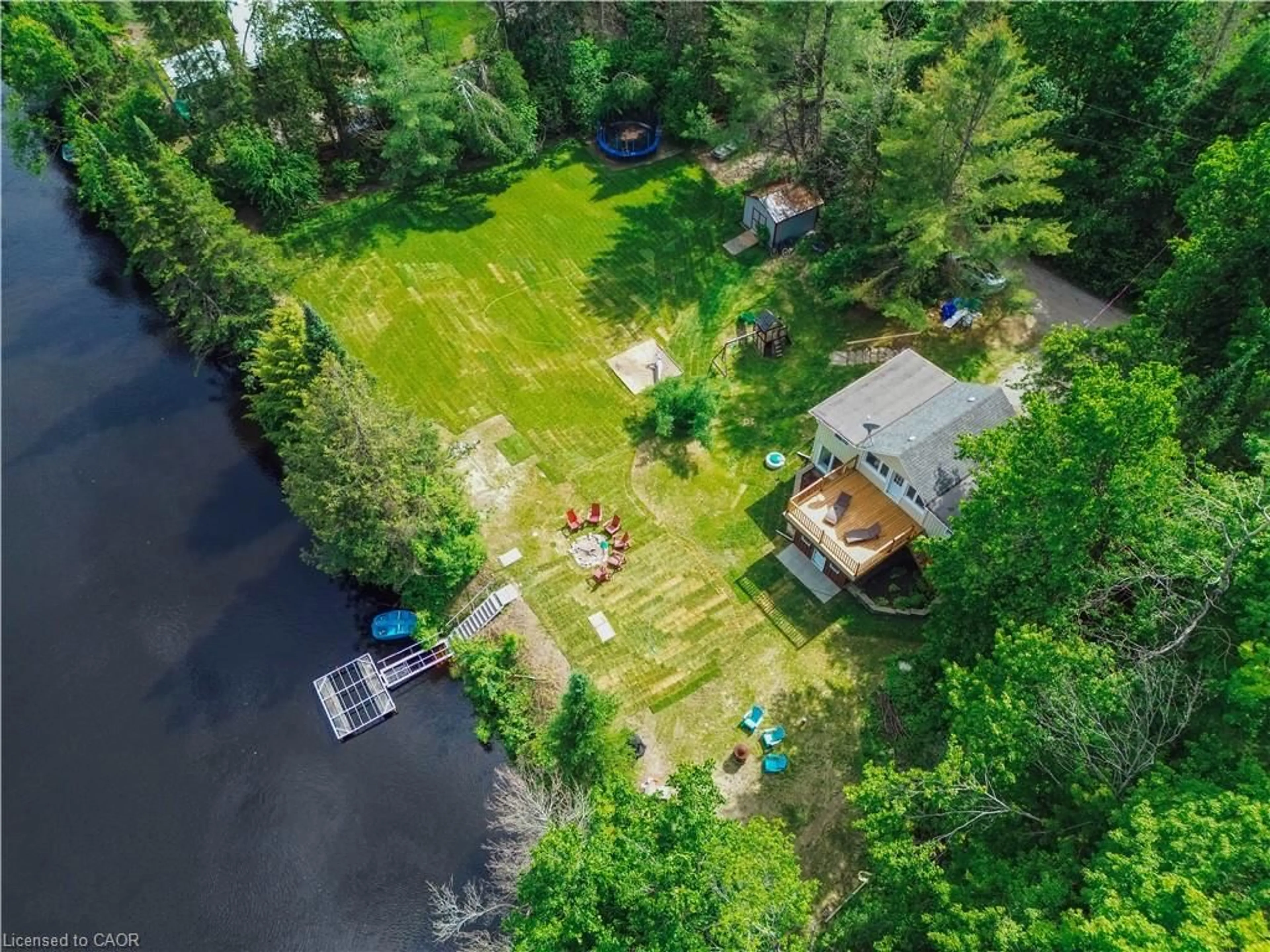 A pic from outside/outdoor area/front of a property/back of a property/a pic from drone, water/lake/river/ocean view for 11 Side Rd, Kinmount Ontario K0M 1C0
