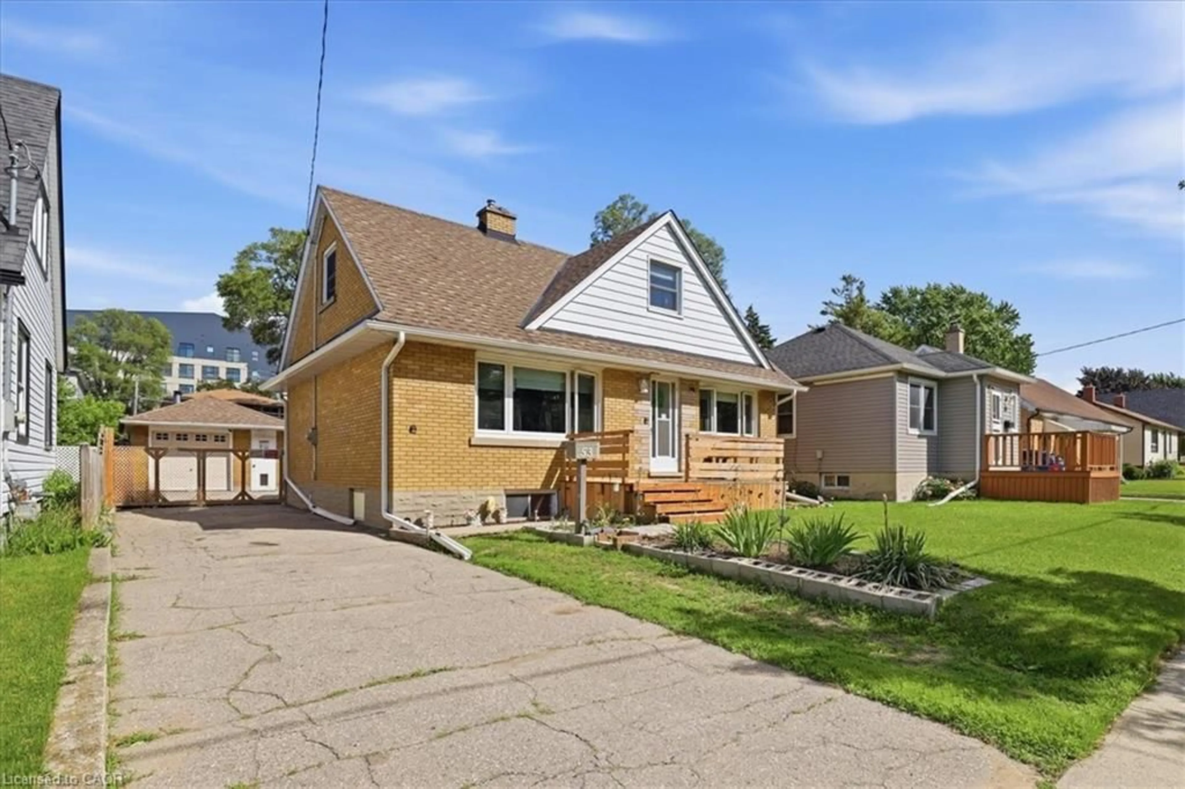 Home with vinyl exterior material, street for 53 Sixth Ave, Kitchener Ontario N2C 1P9