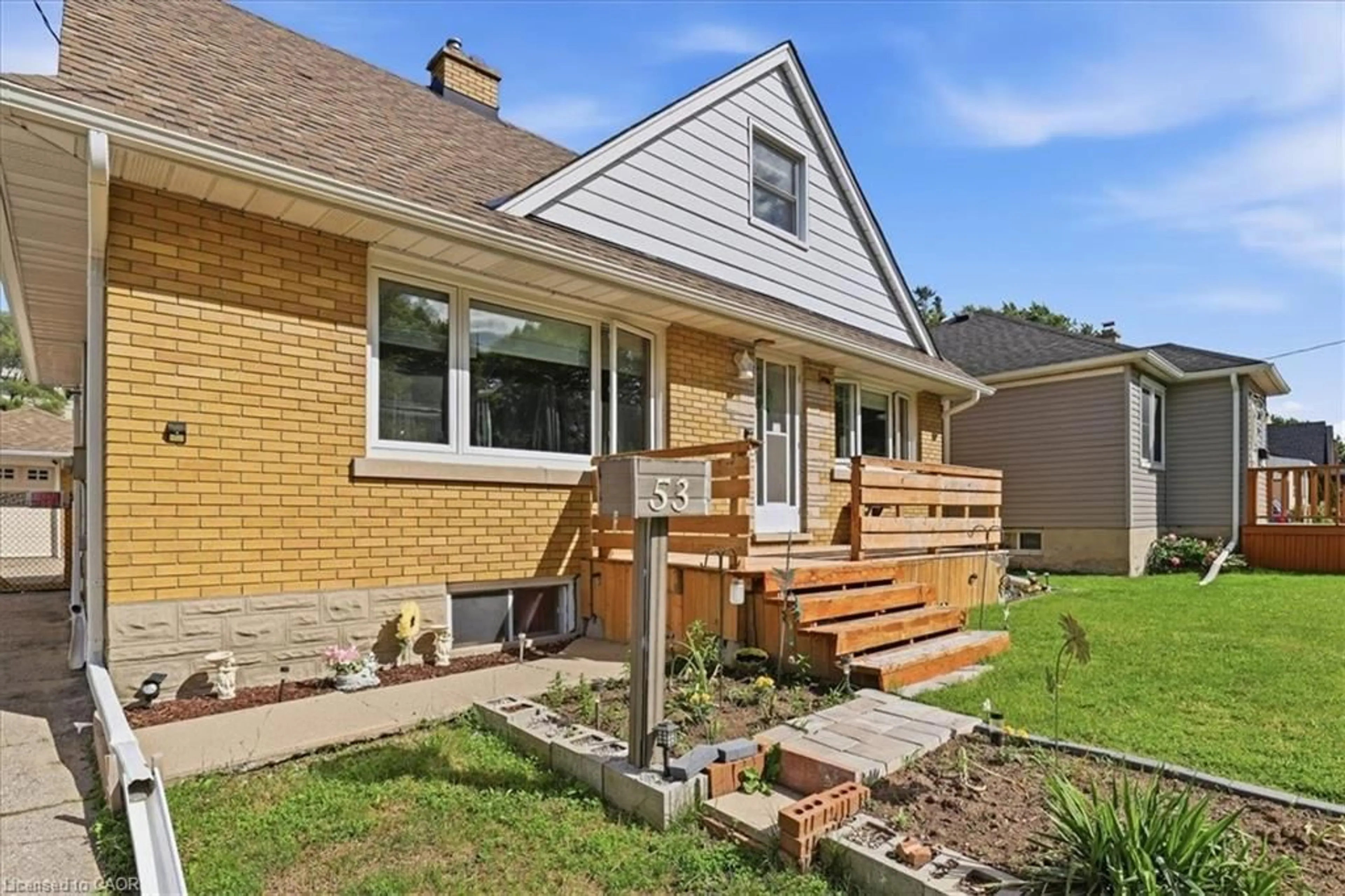 Home with brick exterior material, street for 53 Sixth Ave, Kitchener Ontario N2C 1P9