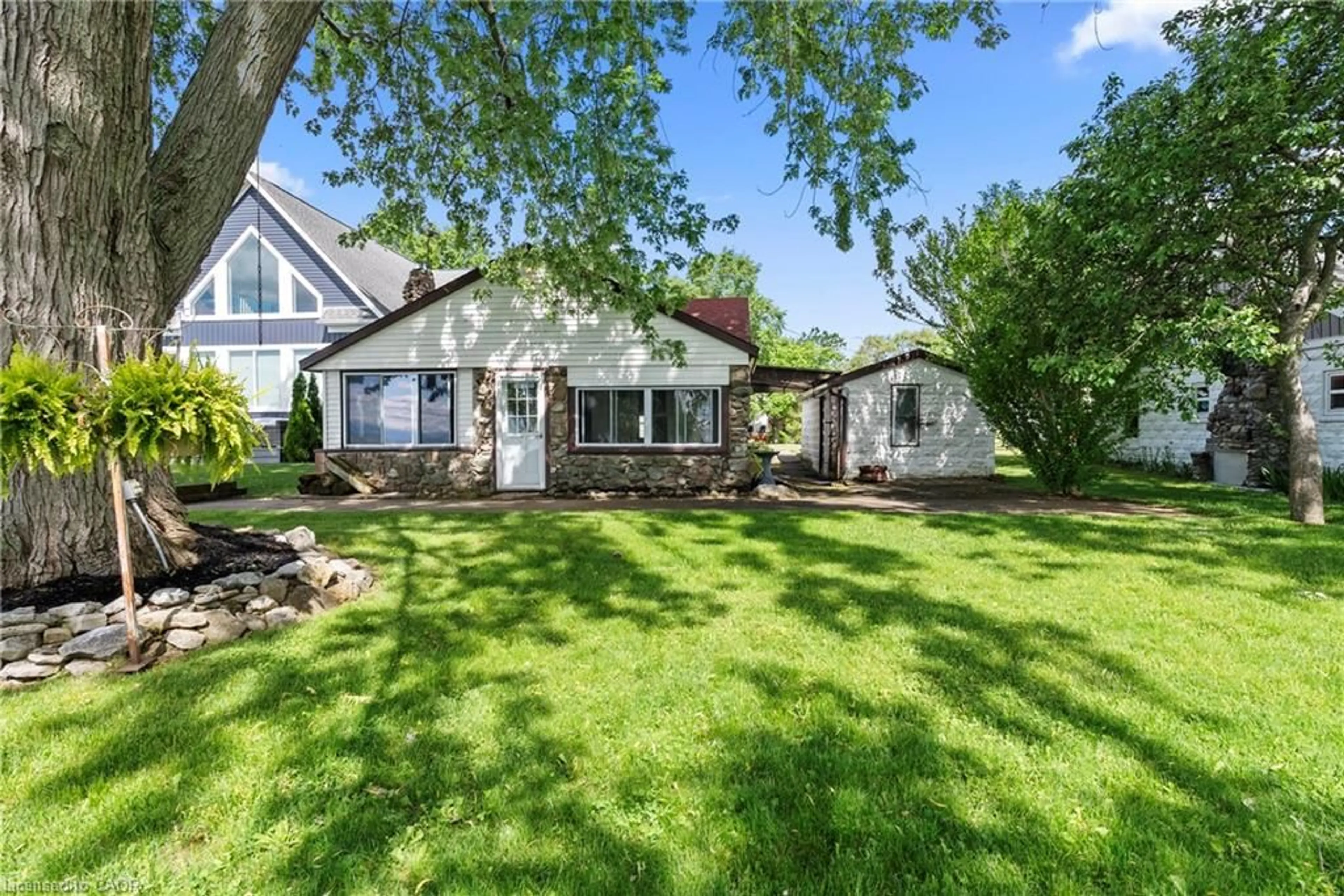 A pic from outside/outdoor area/front of a property/back of a property/a pic from drone, street for 11273 Harbourview Rd, Port Colborne Ontario L3K 5V4