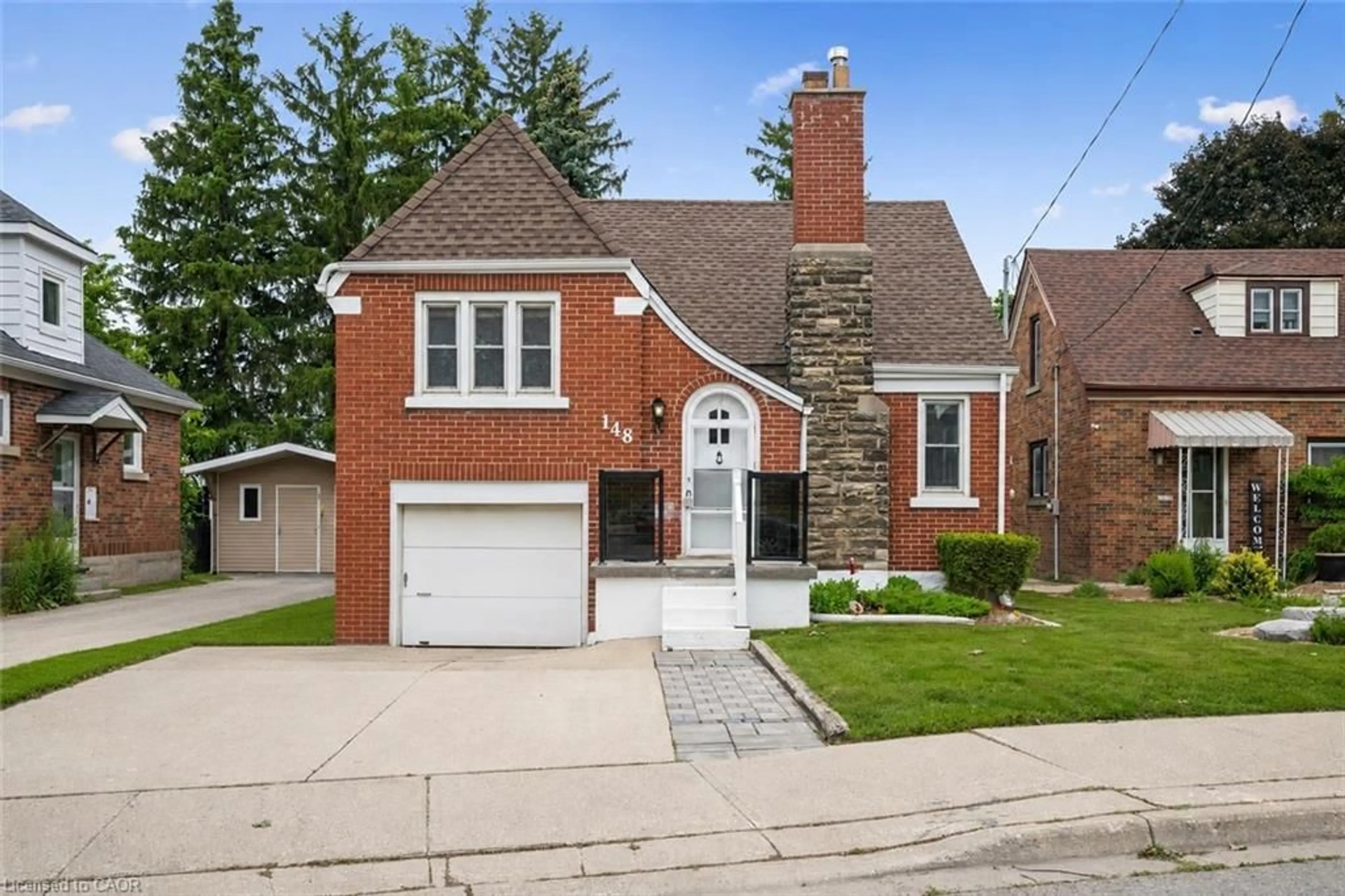 Home with brick exterior material, street for 148 Waterloo St, Waterloo Ontario N2J 1Y2