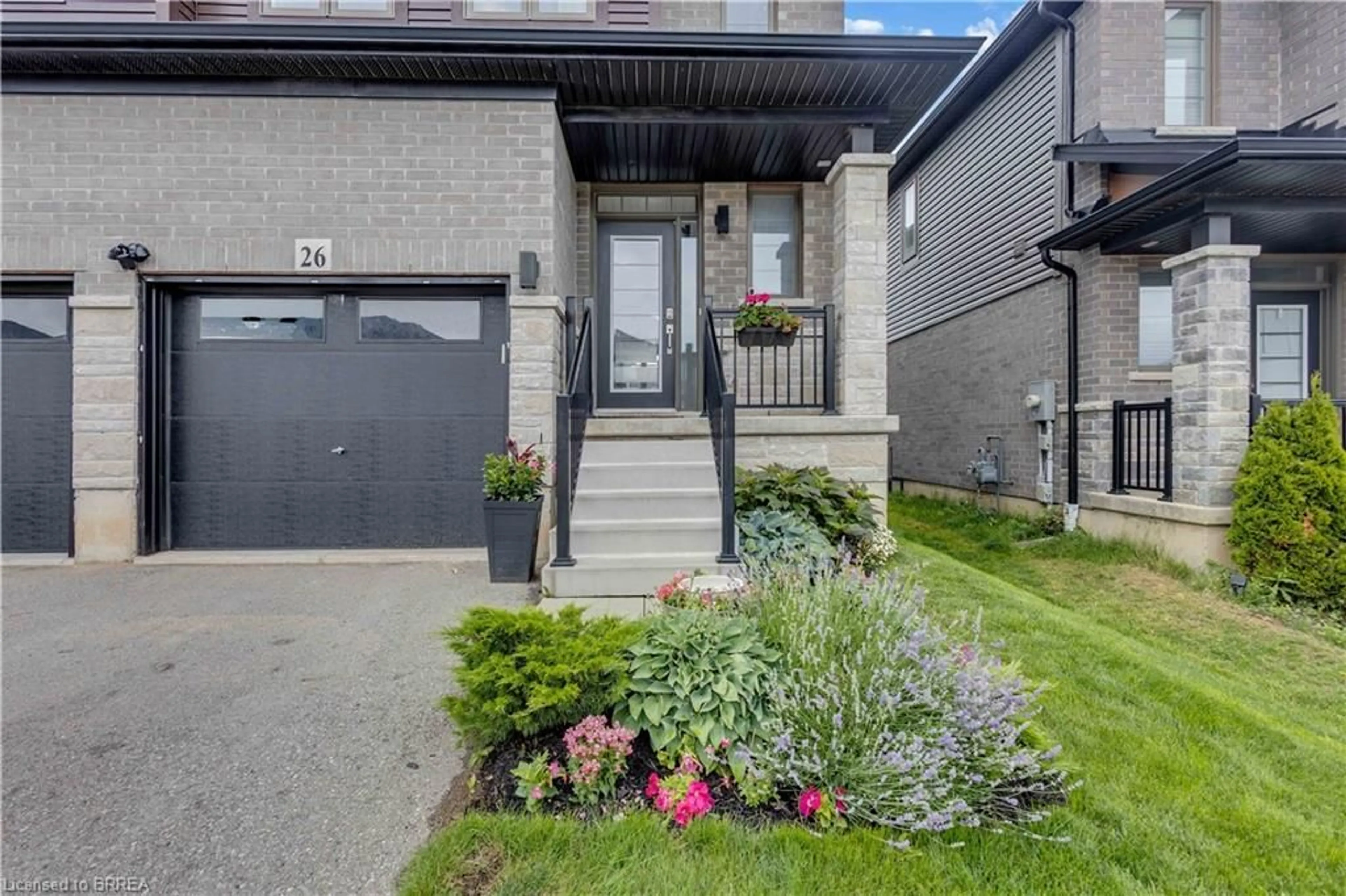 Home with brick exterior material, street for 26 Baker Lane, Paris Ontario N3L 0J7