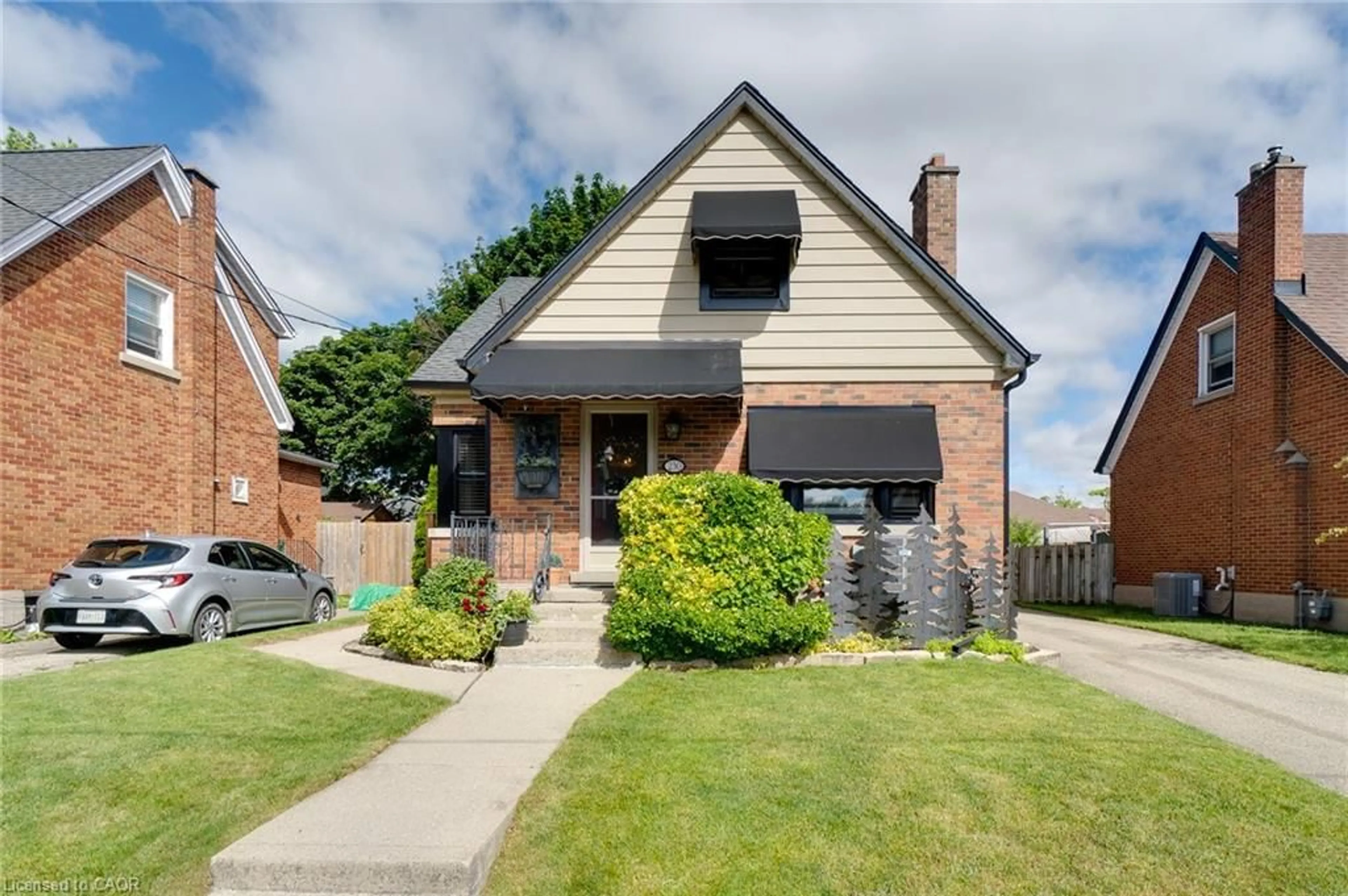 Home with brick exterior material, street for 230 Sydney St, Kitchener Ontario N2G 3V7