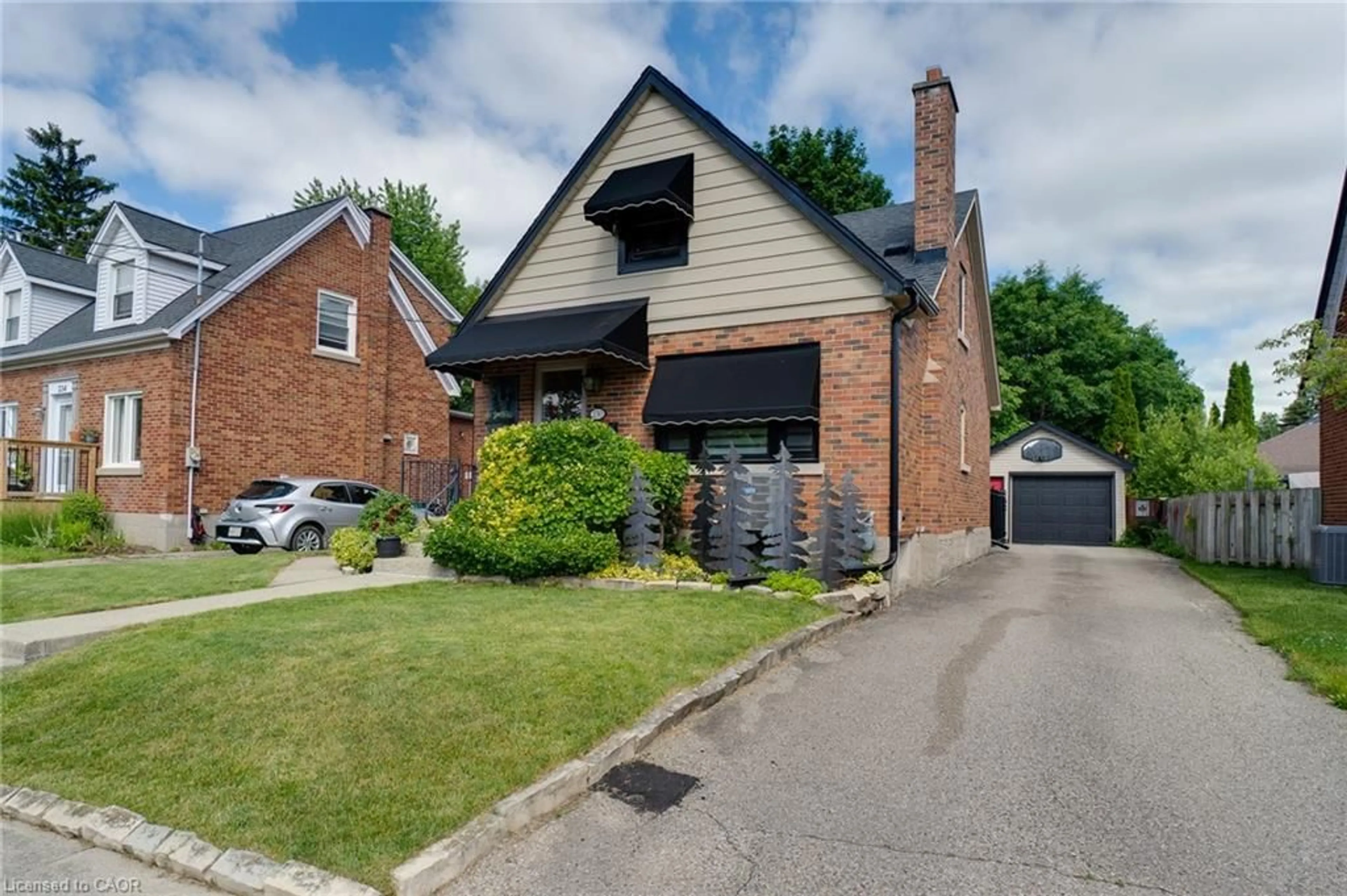 Home with brick exterior material, street for 230 Sydney St, Kitchener Ontario N2G 3V7