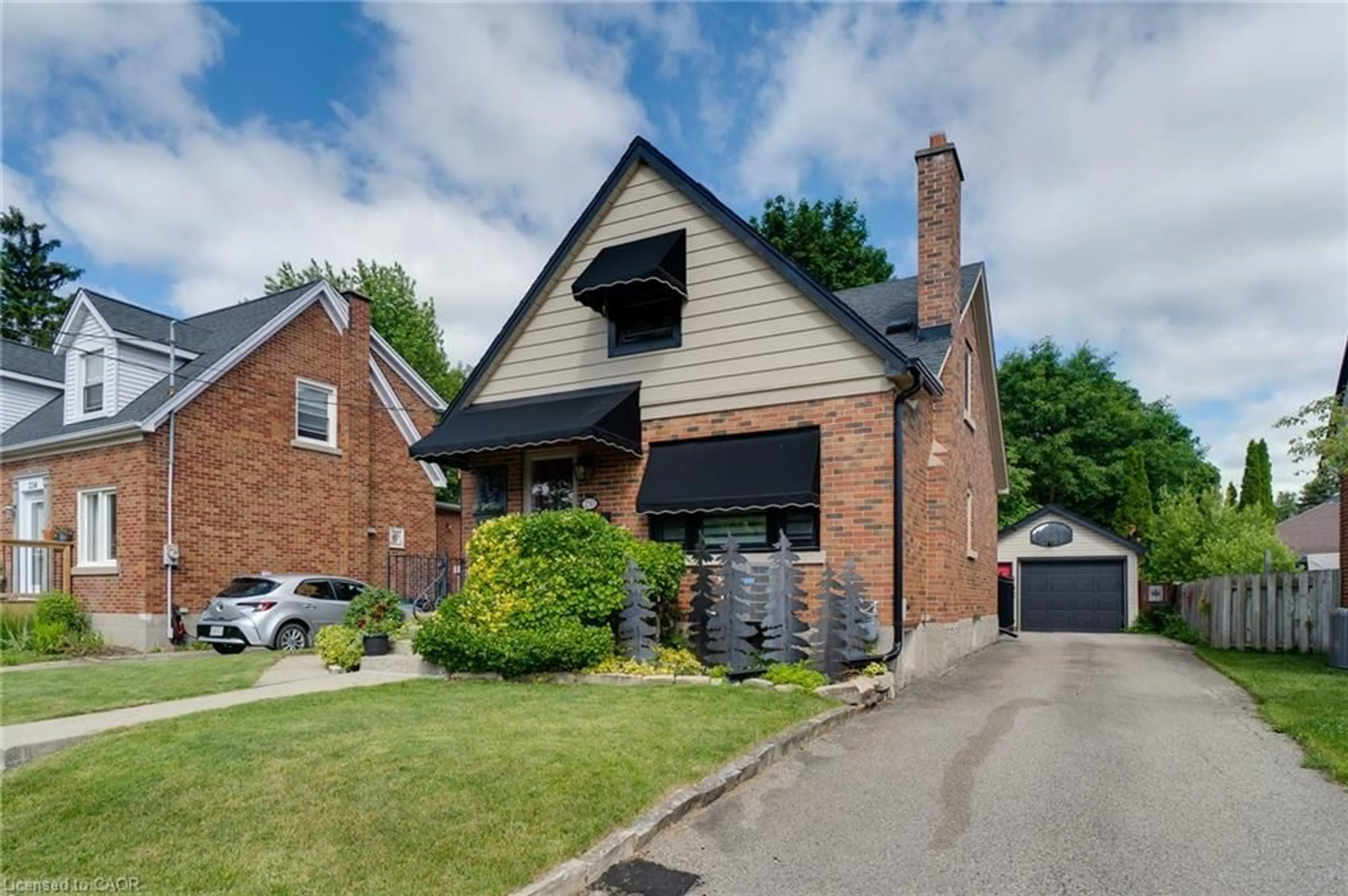 Home with brick exterior material, street for 230 Sydney St, Kitchener Ontario N2G 3V7