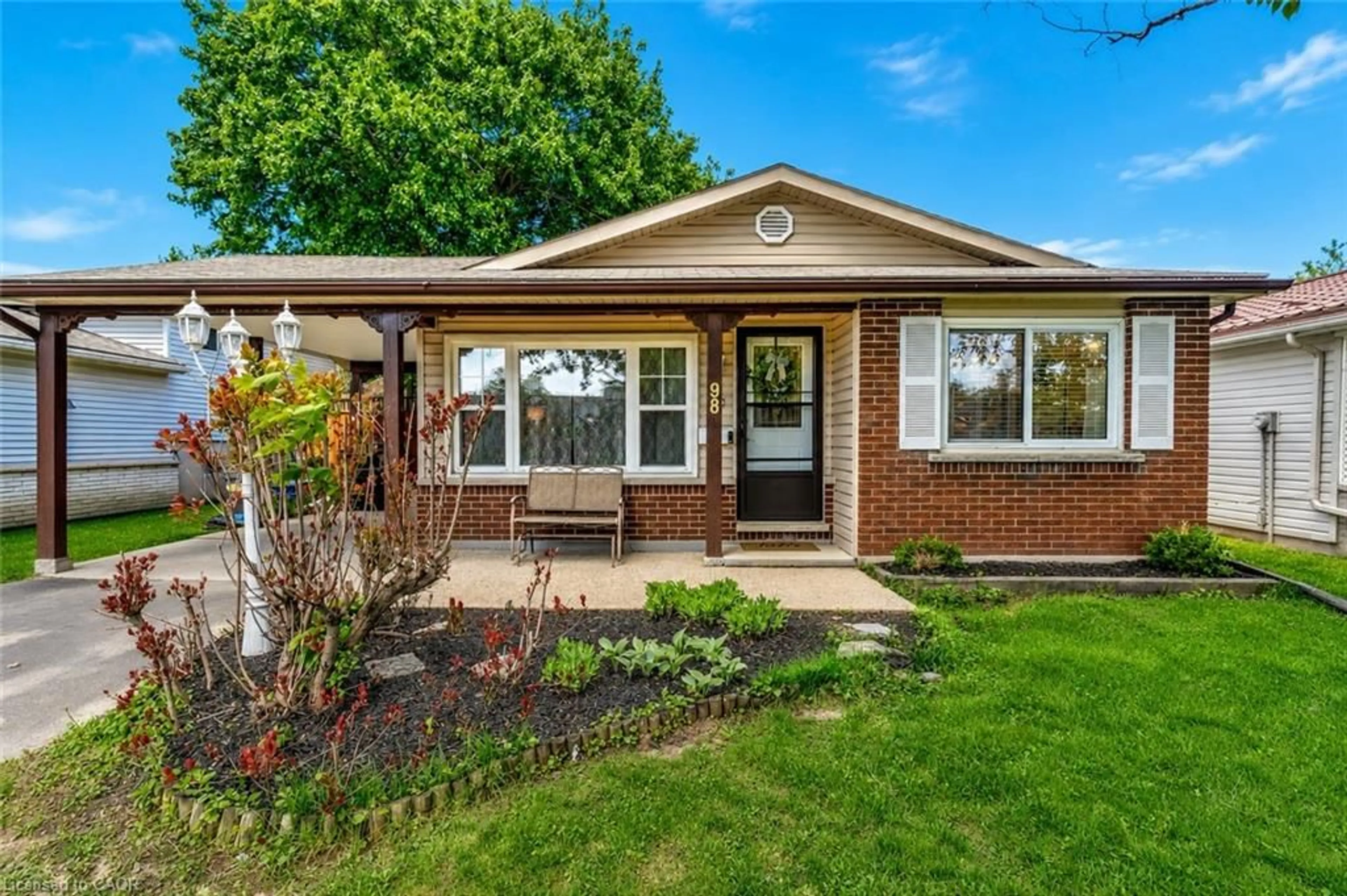 Home with brick exterior material, street for 98 Belwood Cres, Kitchener Ontario N2C 1Z3