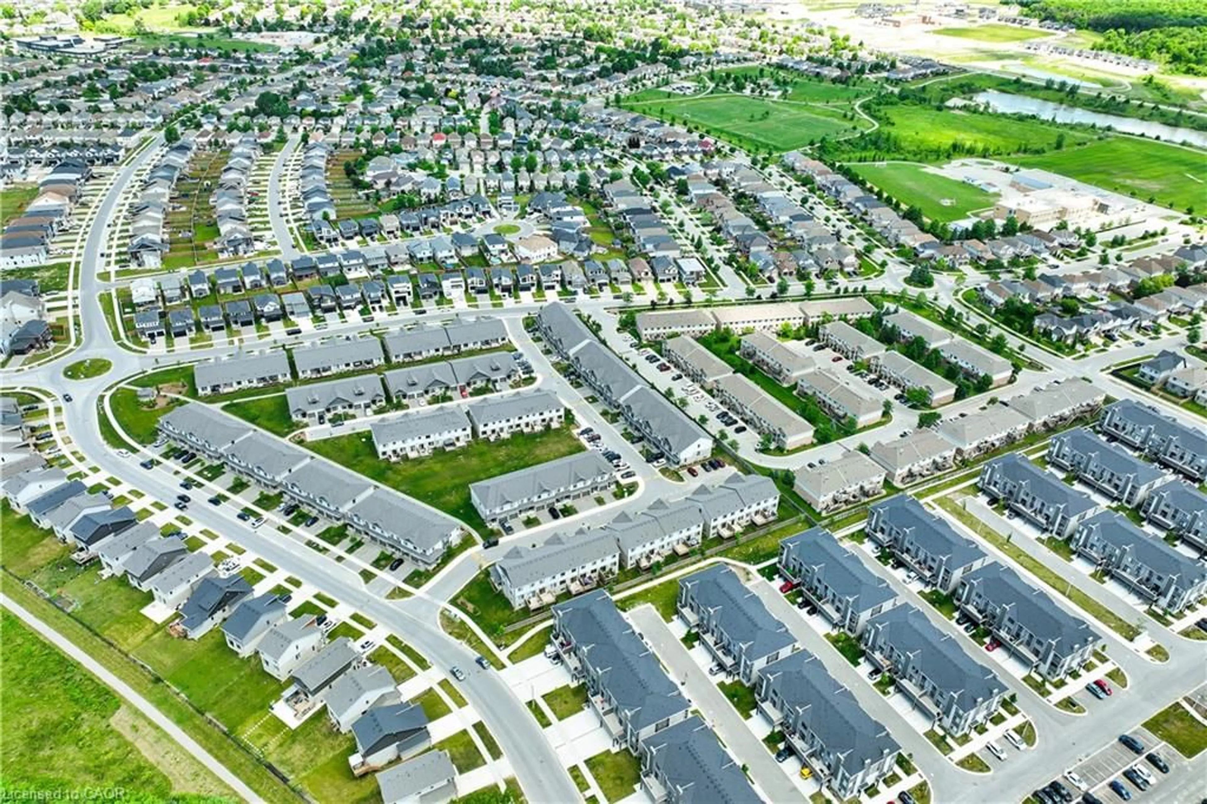A pic from outside/outdoor area/front of a property/back of a property/a pic from drone, street for 745 Chelton Rd #3, London Ontario N6M 0J1
