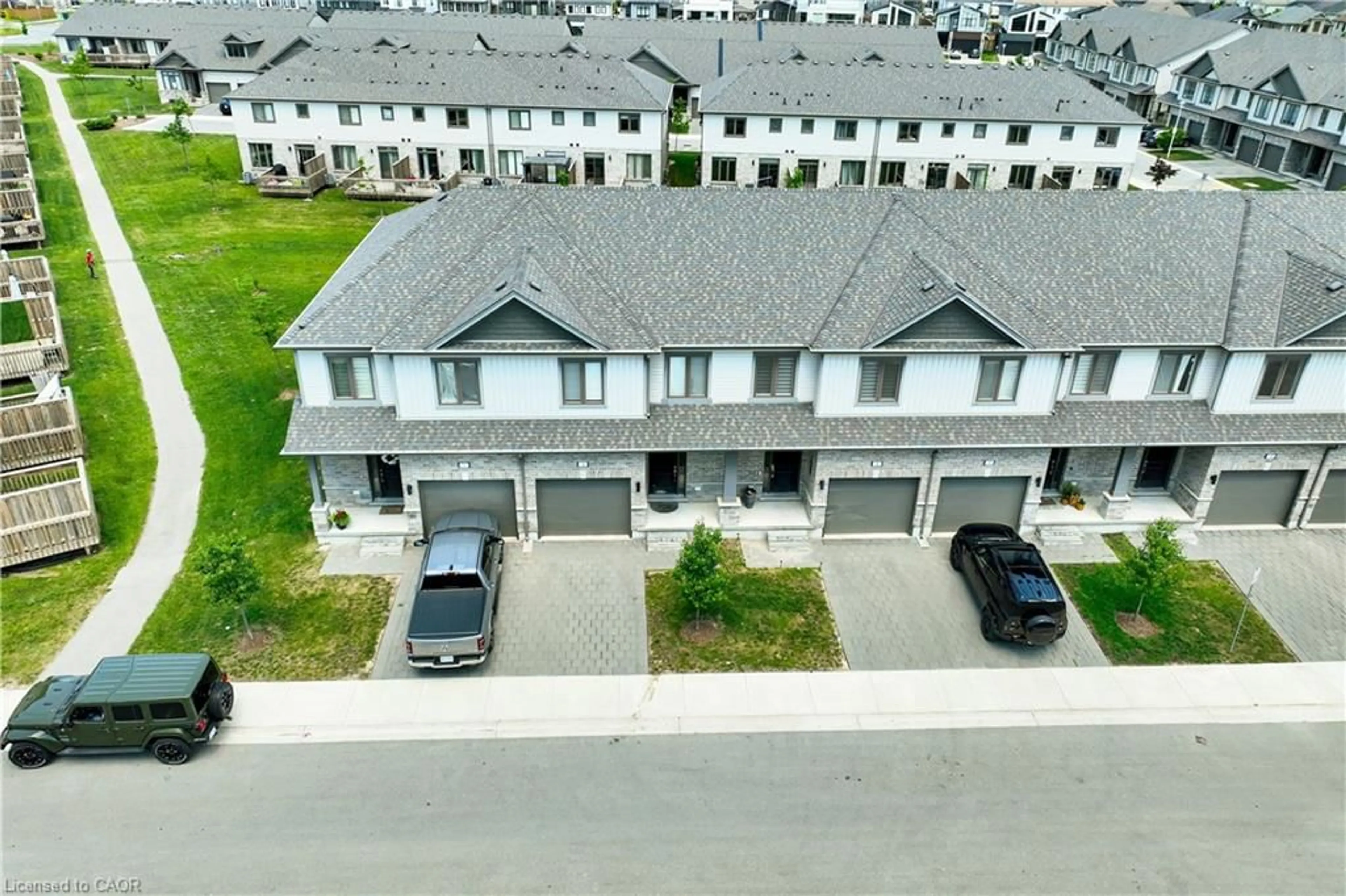 A pic from outside/outdoor area/front of a property/back of a property/a pic from drone, street for 745 Chelton Rd #3, London Ontario N6M 0J1
