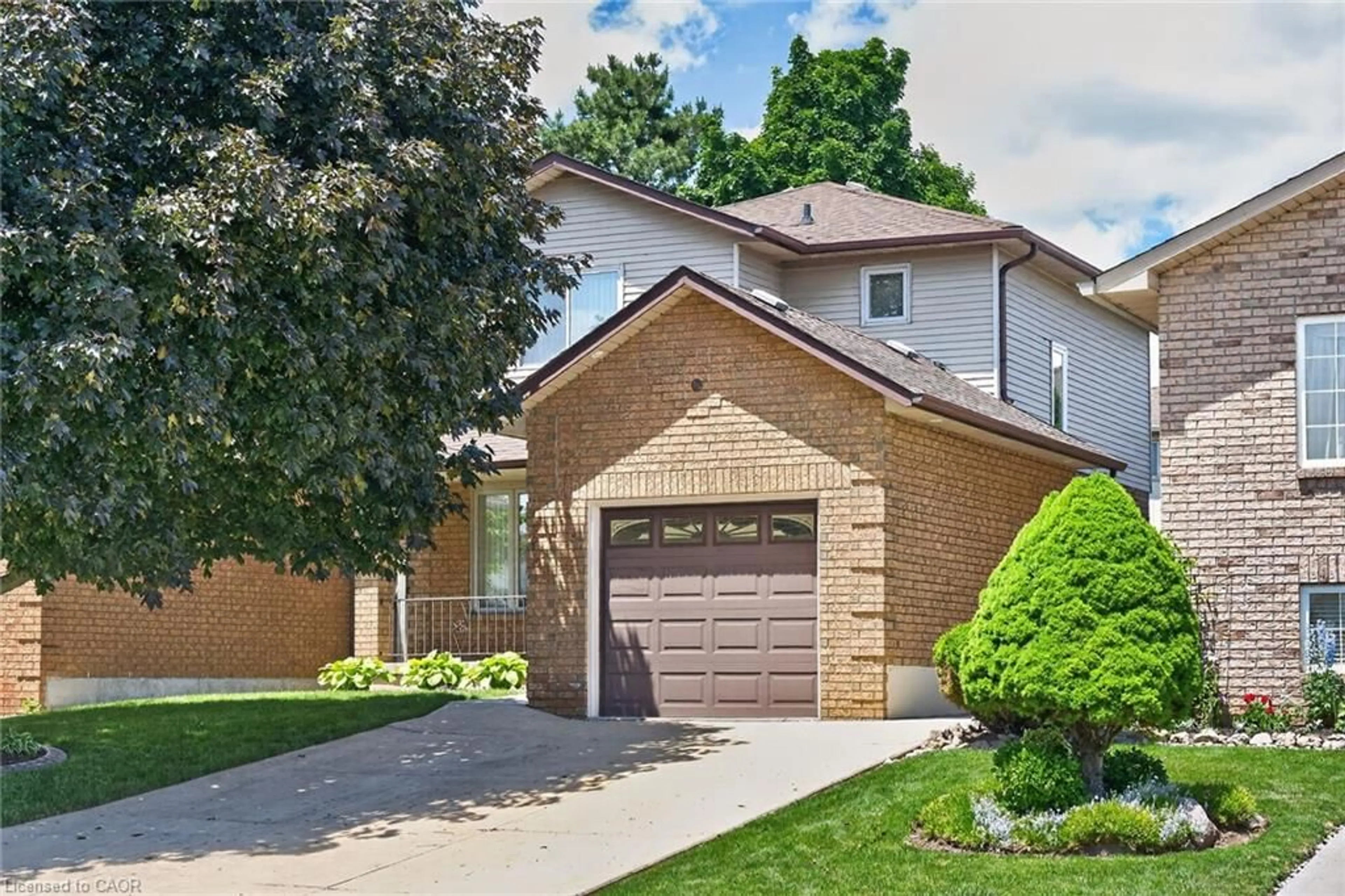 Home with brick exterior material, street for 45 Ossington Dr, Hamilton Ontario L8W 3S4