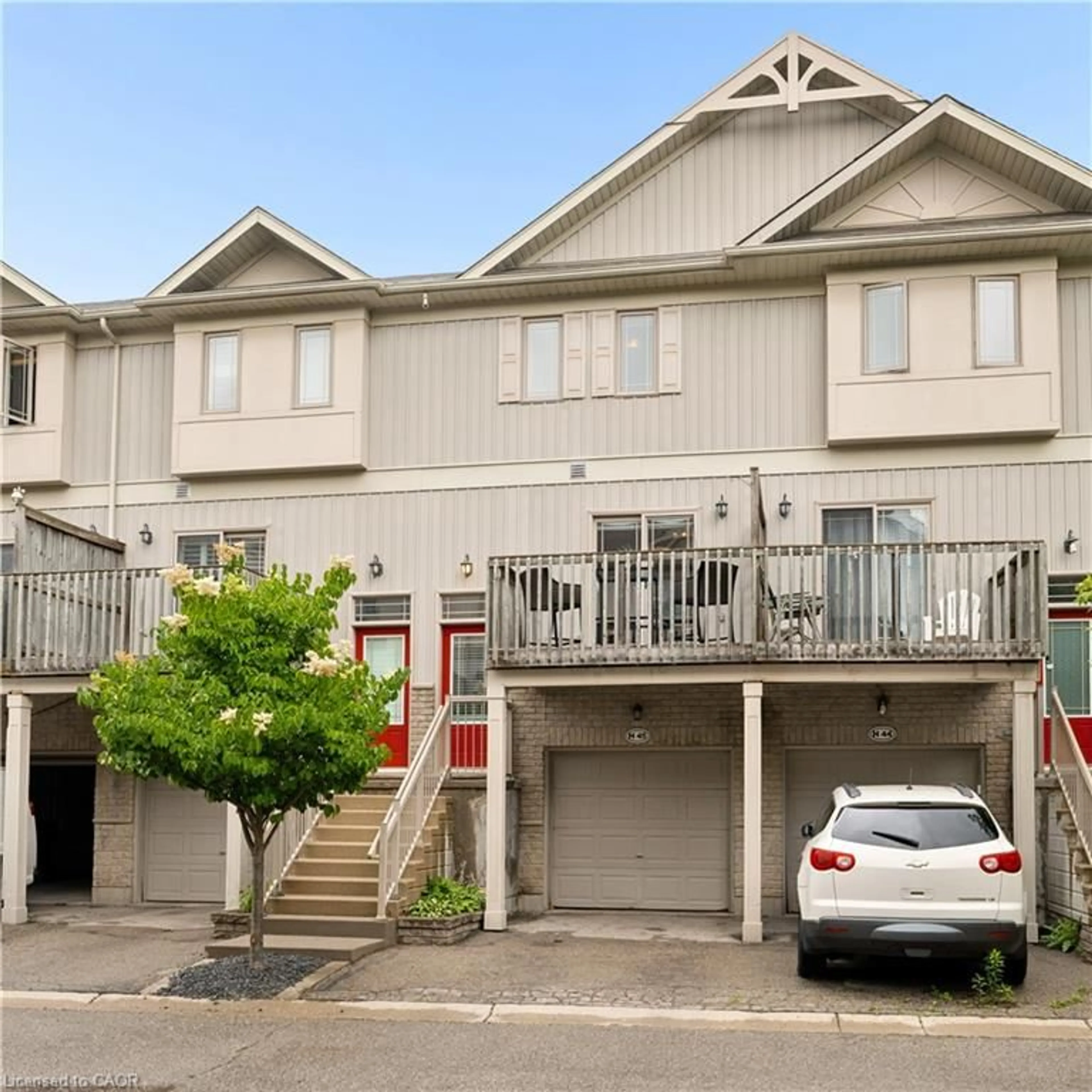 Home with vinyl exterior material, street for 619 Wild Ginger Ave #H45, Waterloo Ontario N2V 2X1