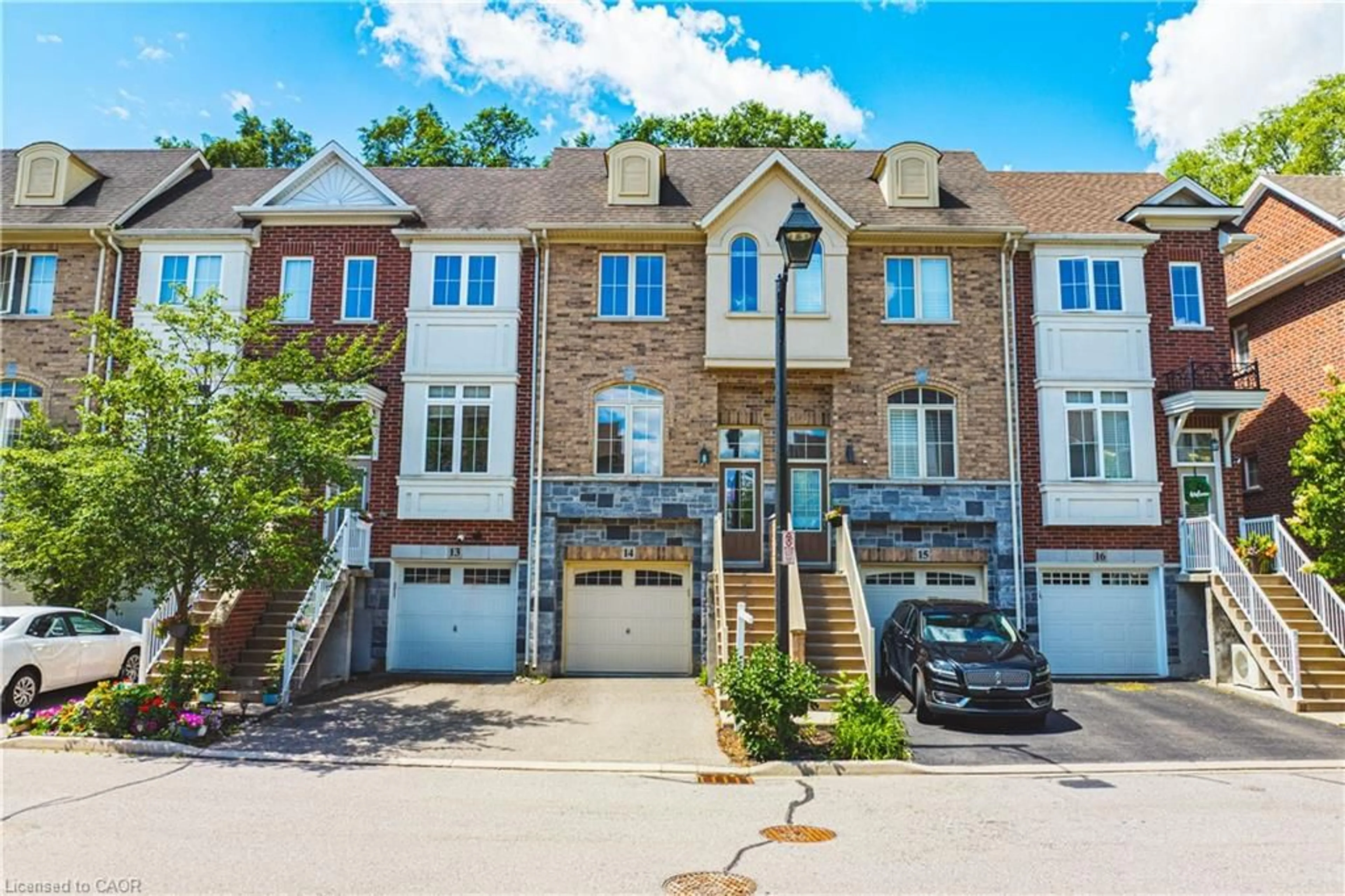 A pic from outside/outdoor area/front of a property/back of a property/a pic from drone, street for 181 Plains Rd #14, Burlington Ontario L7T 0B1