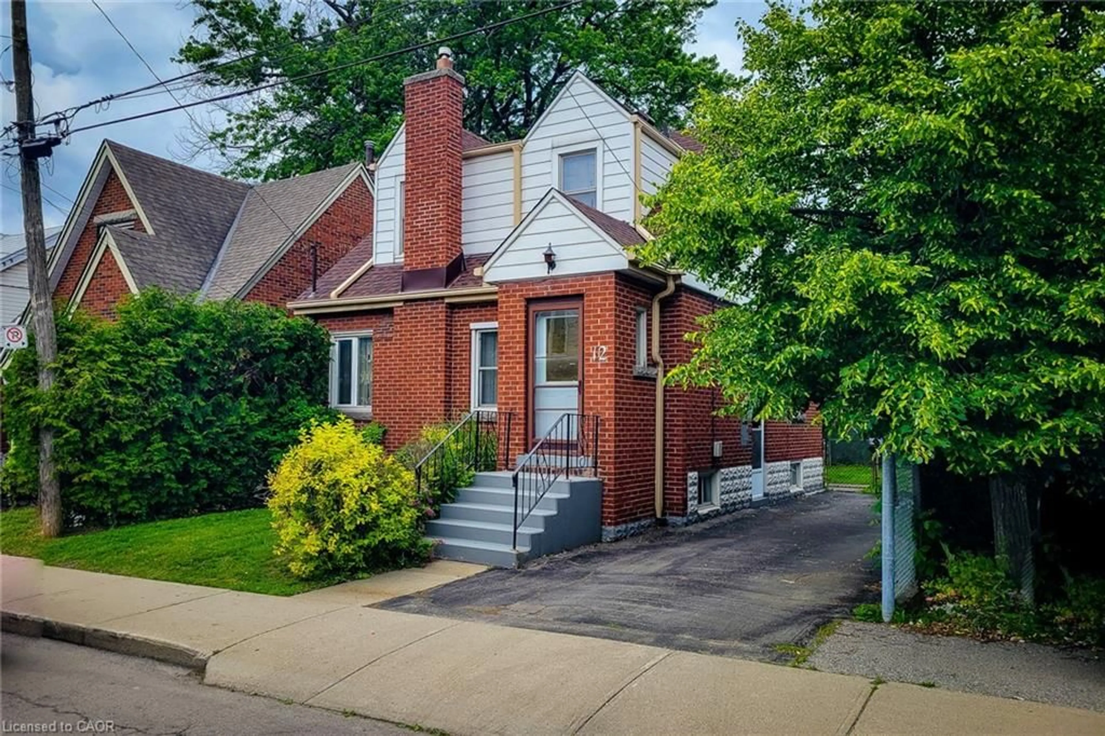 Home with brick exterior material, street for 12 East 27th St, Hamilton Ontario L8V 3E7