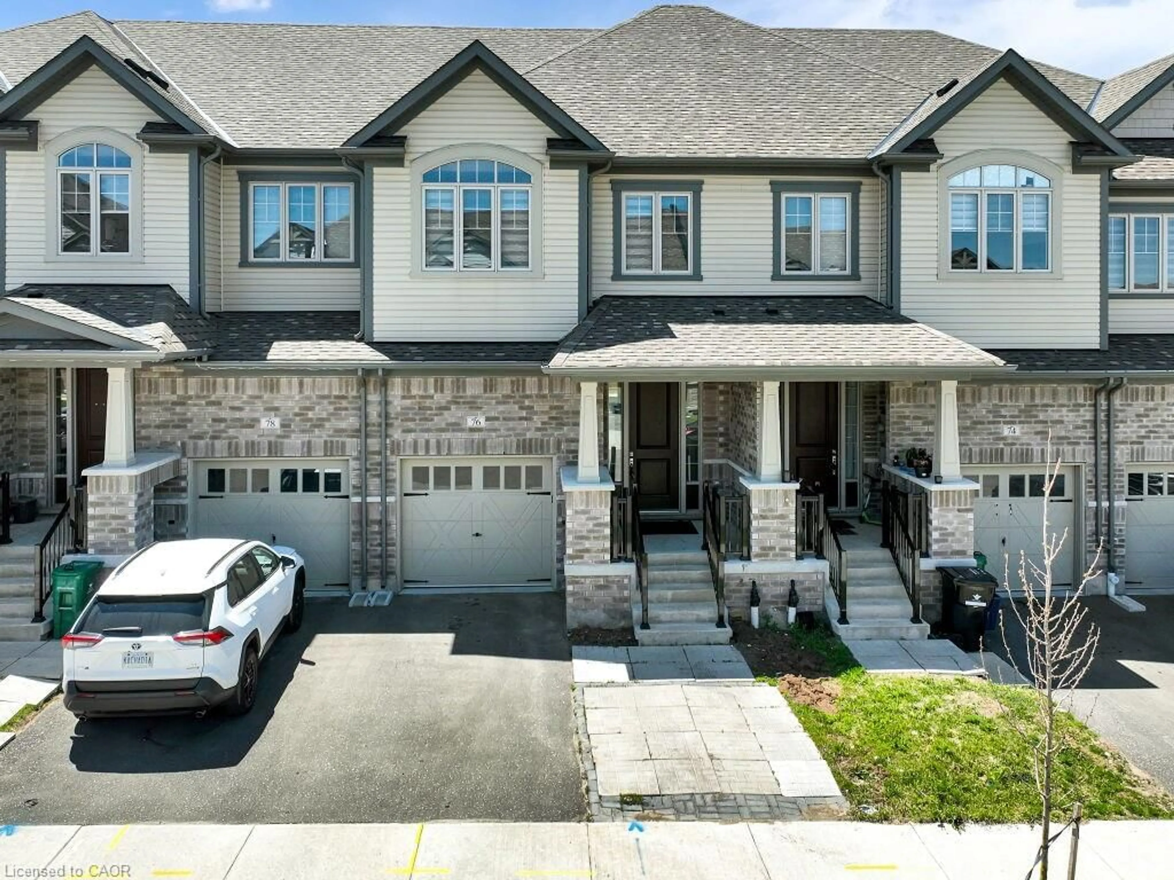 Home with brick exterior material, street for 76 Grassbourne Ave, Kitchener Ontario N2R 0S5
