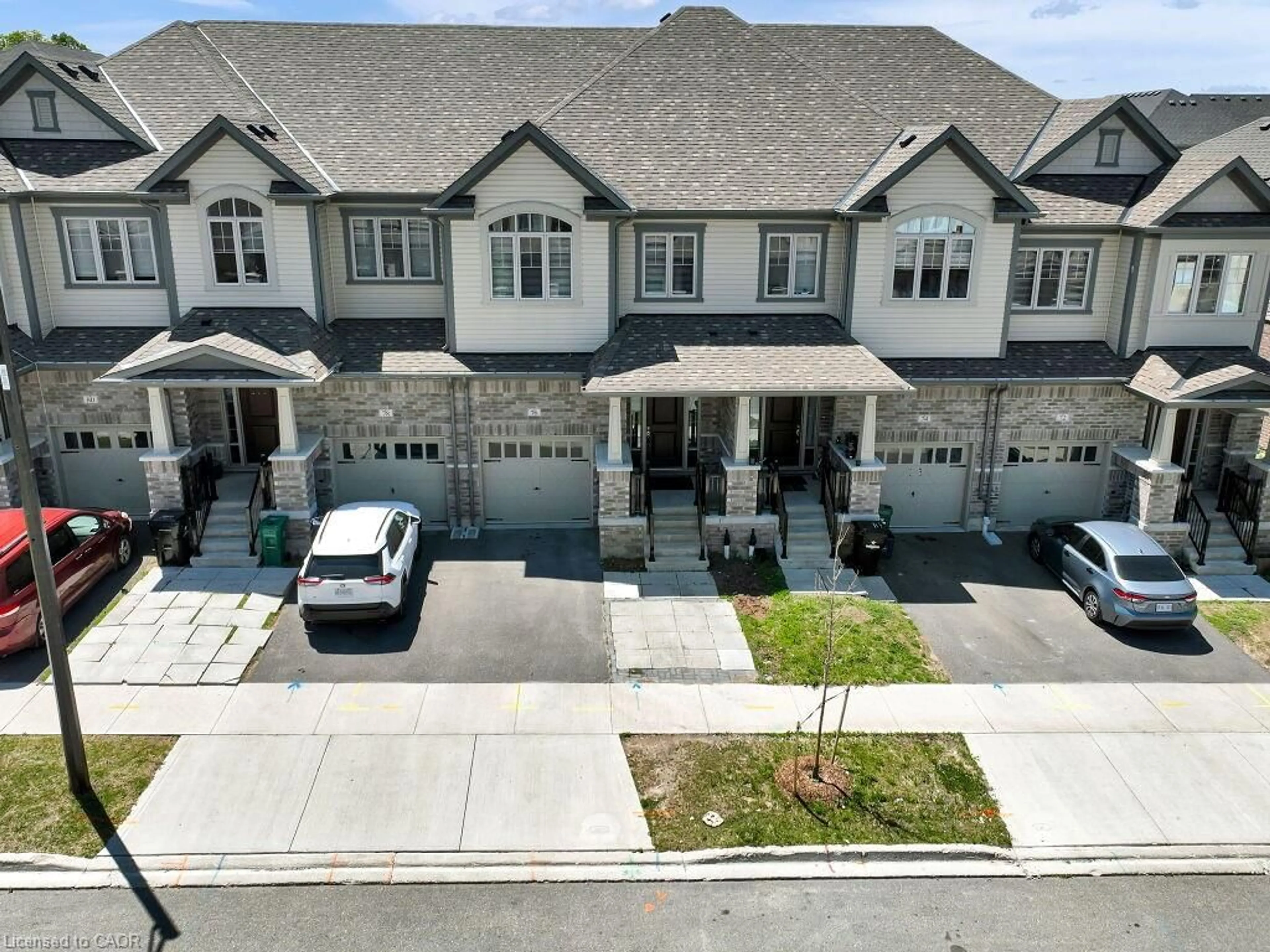 A pic from outside/outdoor area/front of a property/back of a property/a pic from drone, street for 76 Grassbourne Ave, Kitchener Ontario N2R 0S5