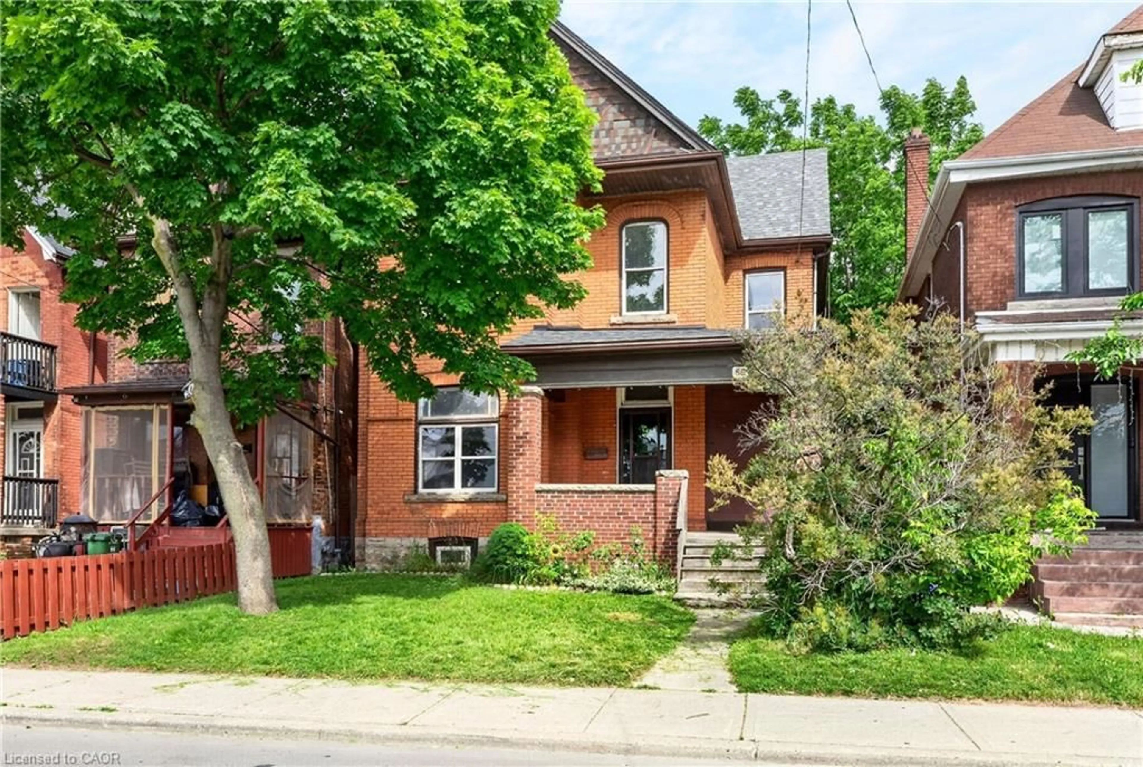 Home with brick exterior material, street for 86 Sherman Ave, Hamilton Ontario L8L 6M4