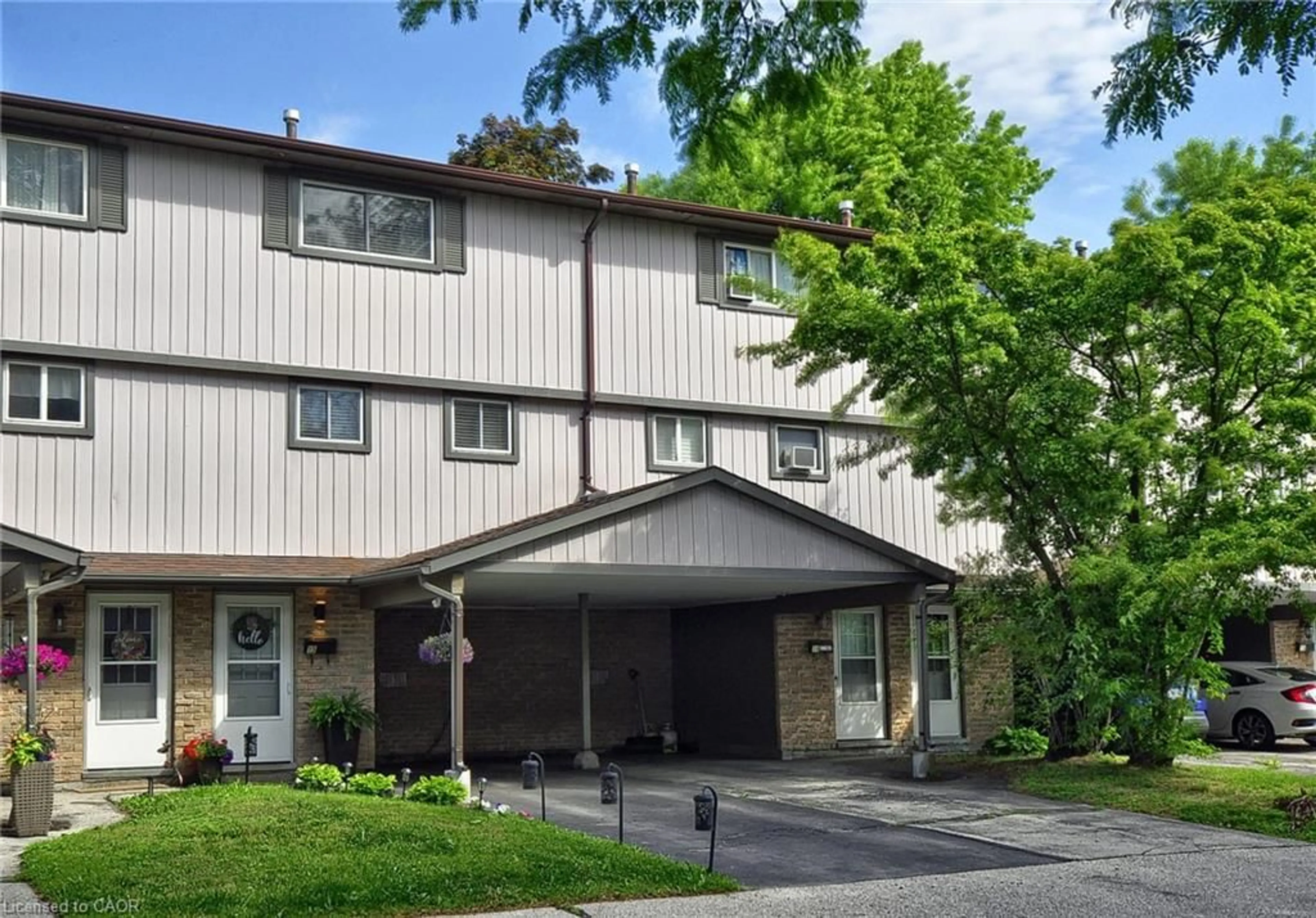 Home with vinyl exterior material, street for 43 Thaler Ave #15, Kitchener Ontario N2A 1R3