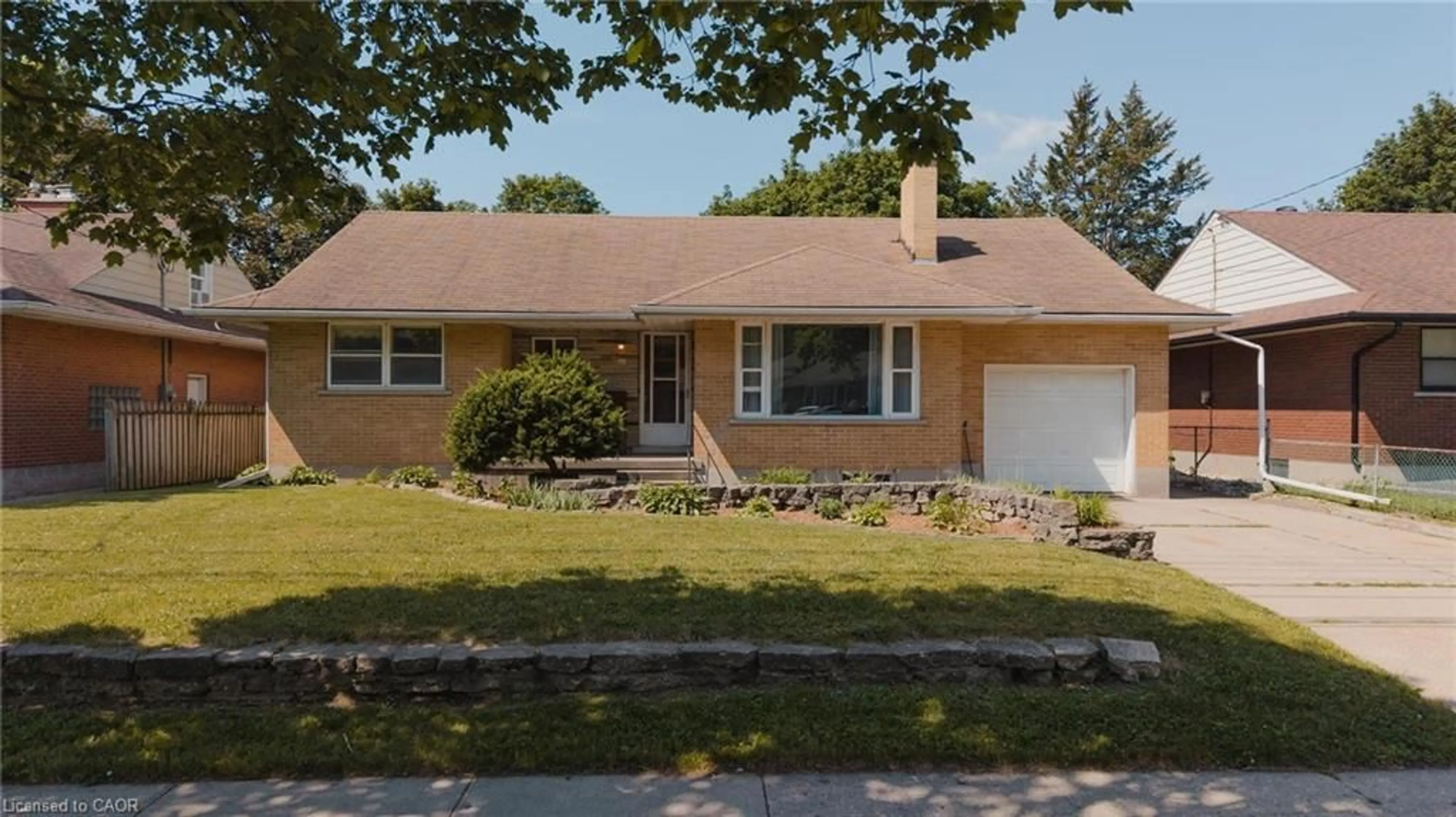 Home with vinyl exterior material, street for 223 River Rd, Kitchener Ontario N2B 2G9