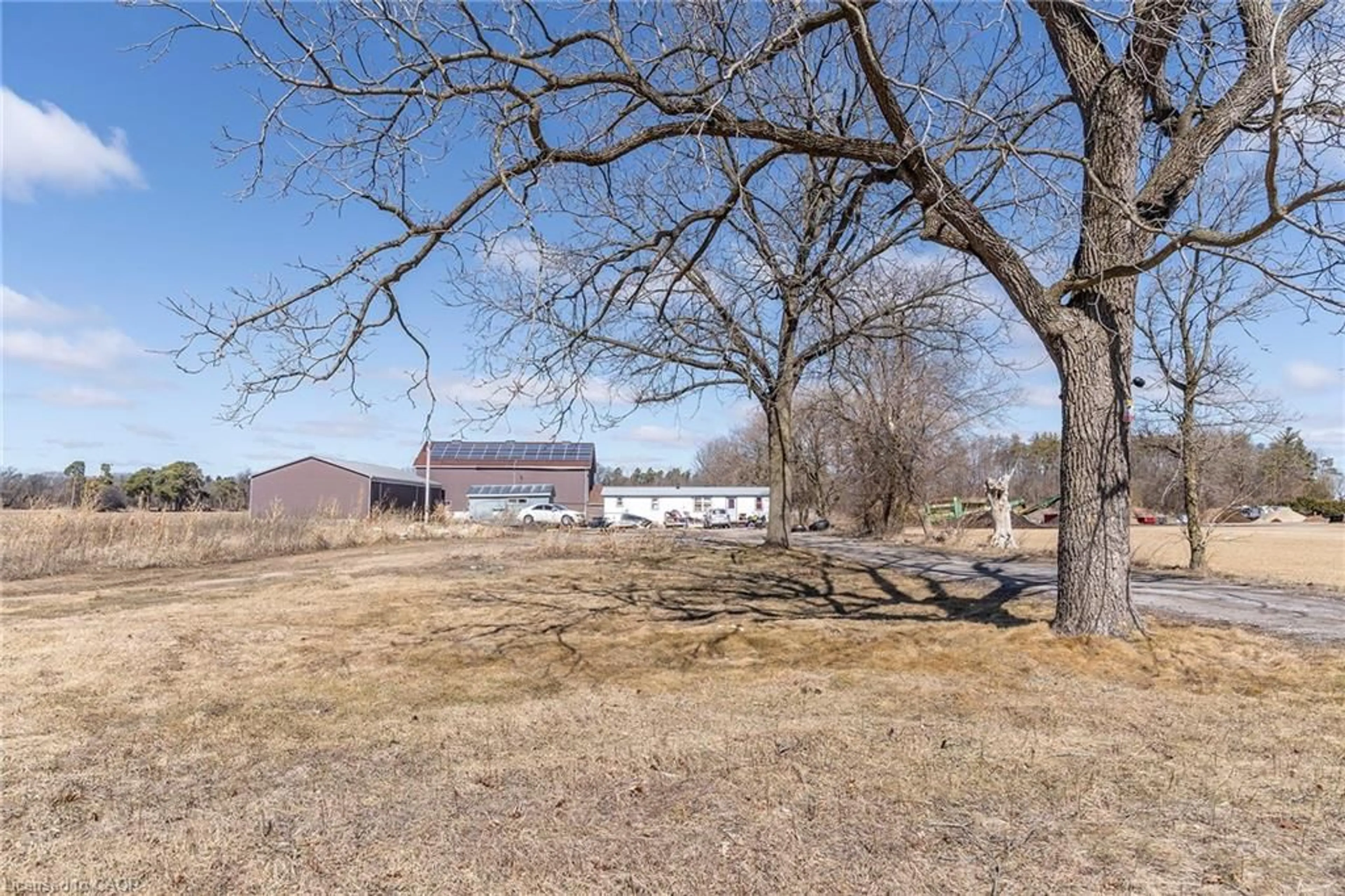 A pic from outside/outdoor area/front of a property/back of a property/a pic from drone, unknown for 131 Highway 6, Simcoe Ontario N3Y 4K2