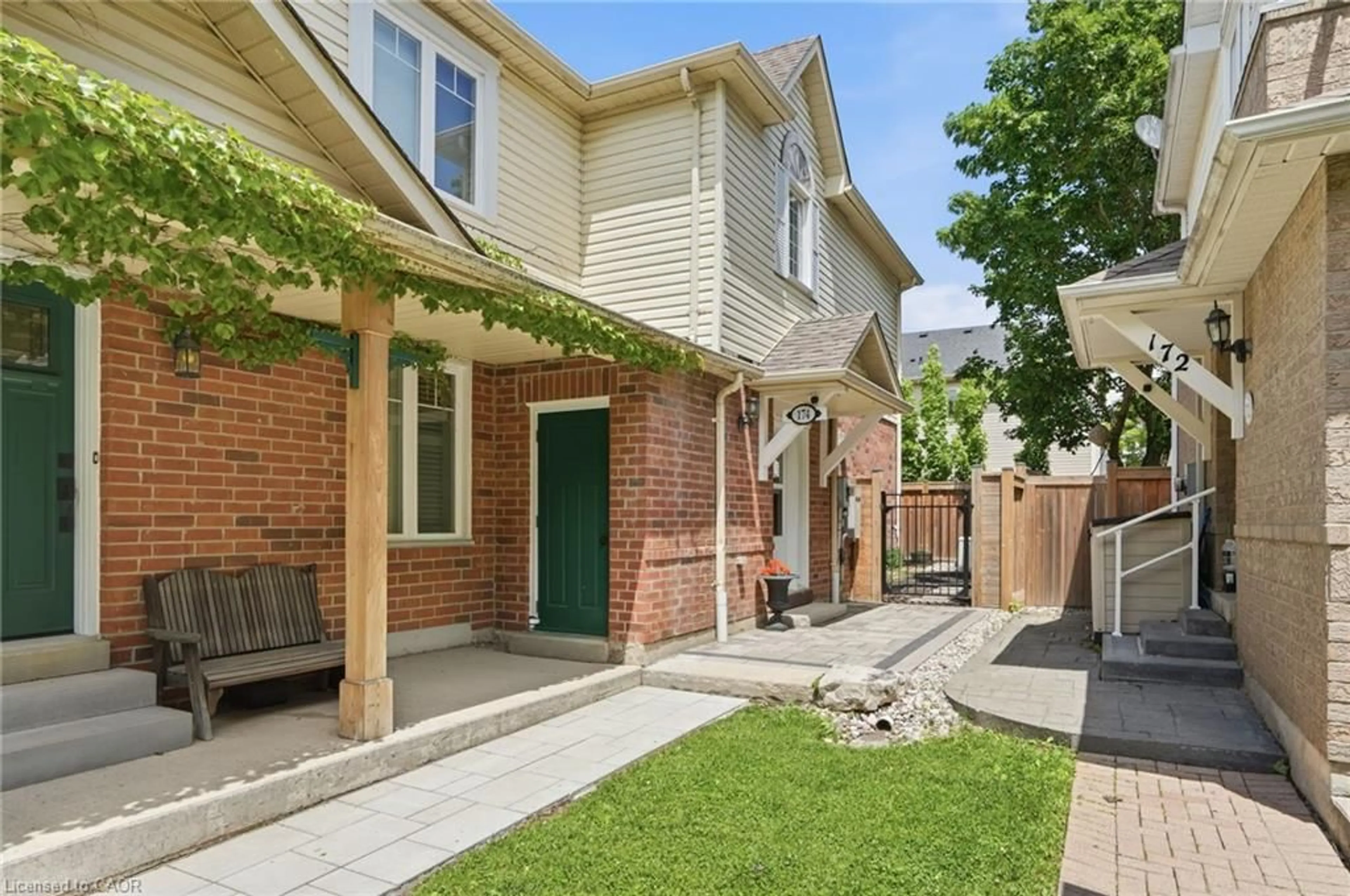 Home with brick exterior material, street for 174 Fellowes Cres, Waterdown Ontario L8B 0M9