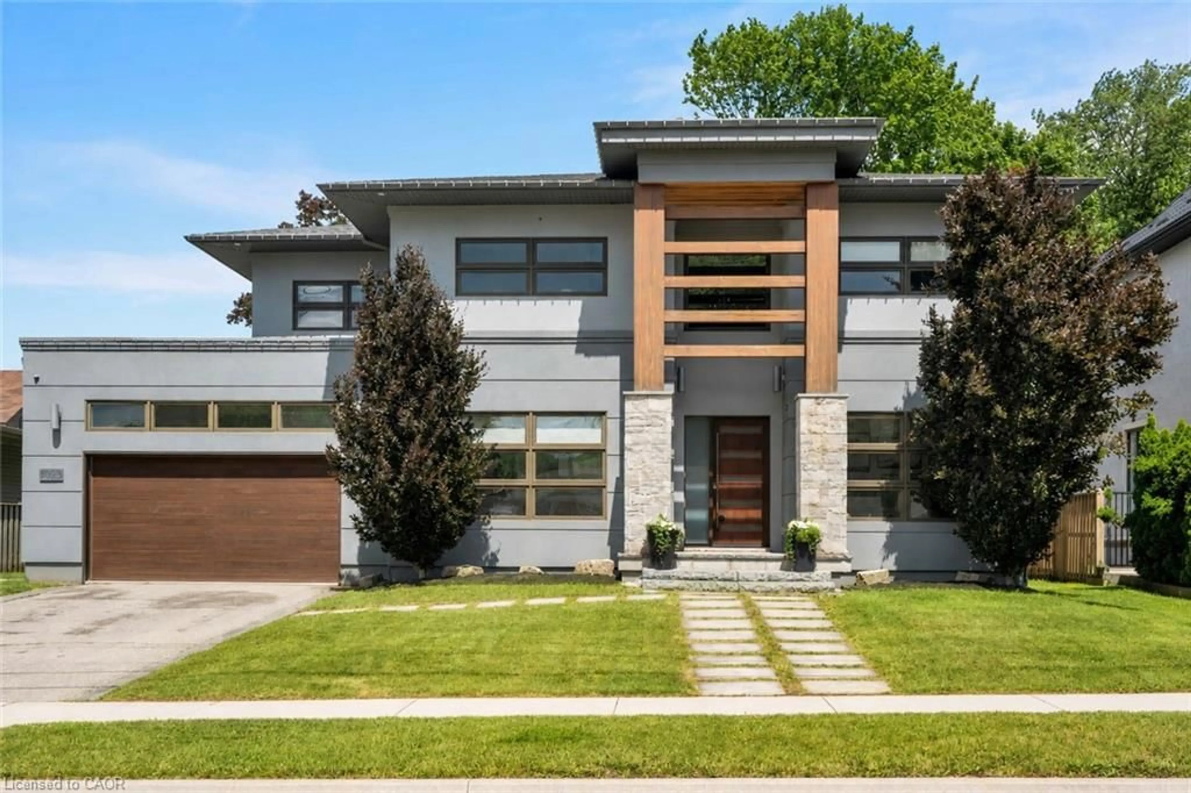 Home with brick exterior material, street for 1025 Bridge Rd, Oakville Ontario L6L 2B4