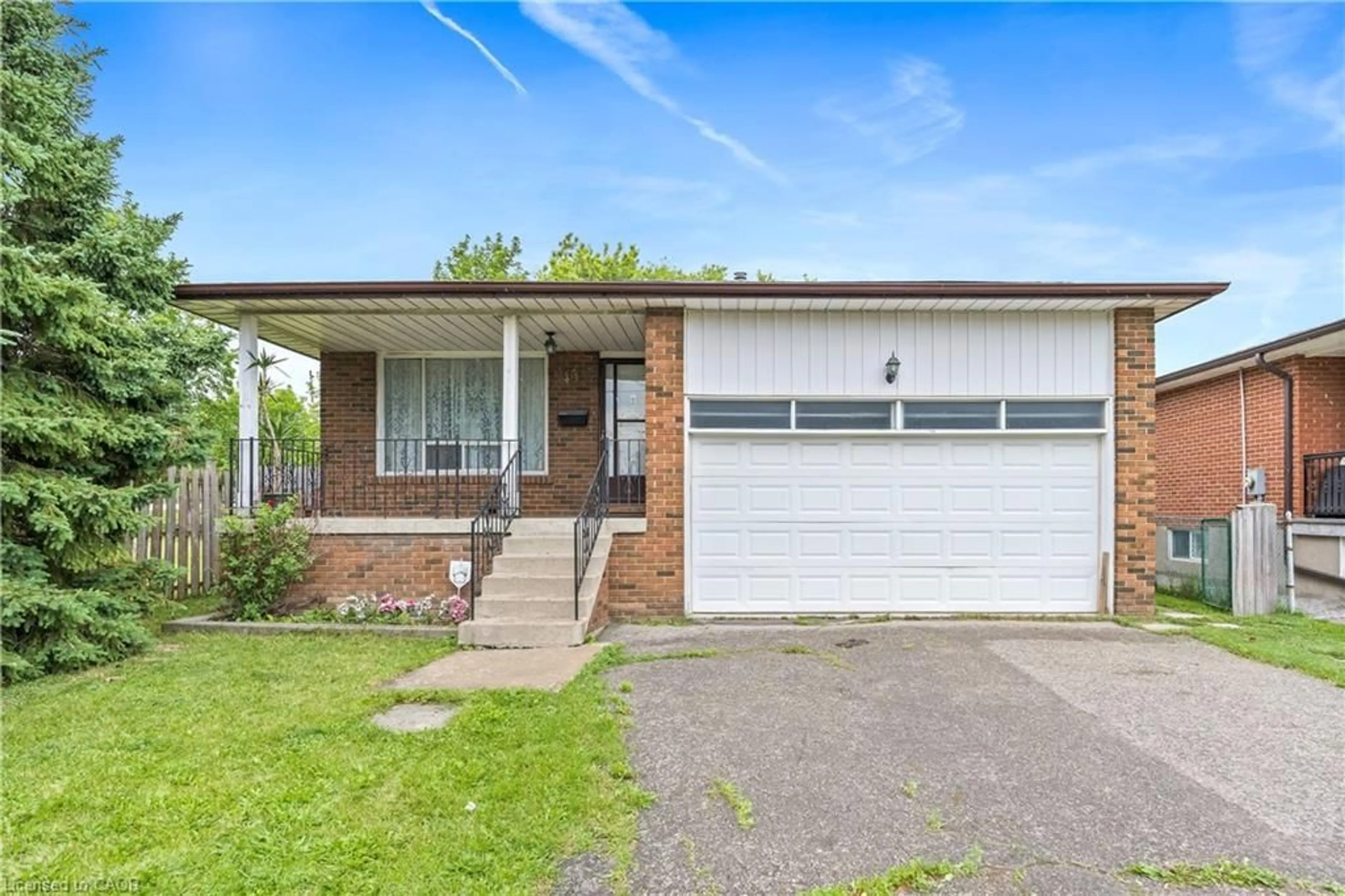 Home with vinyl exterior material, street for 49 Hull St, Malton Ontario L4T 1C4
