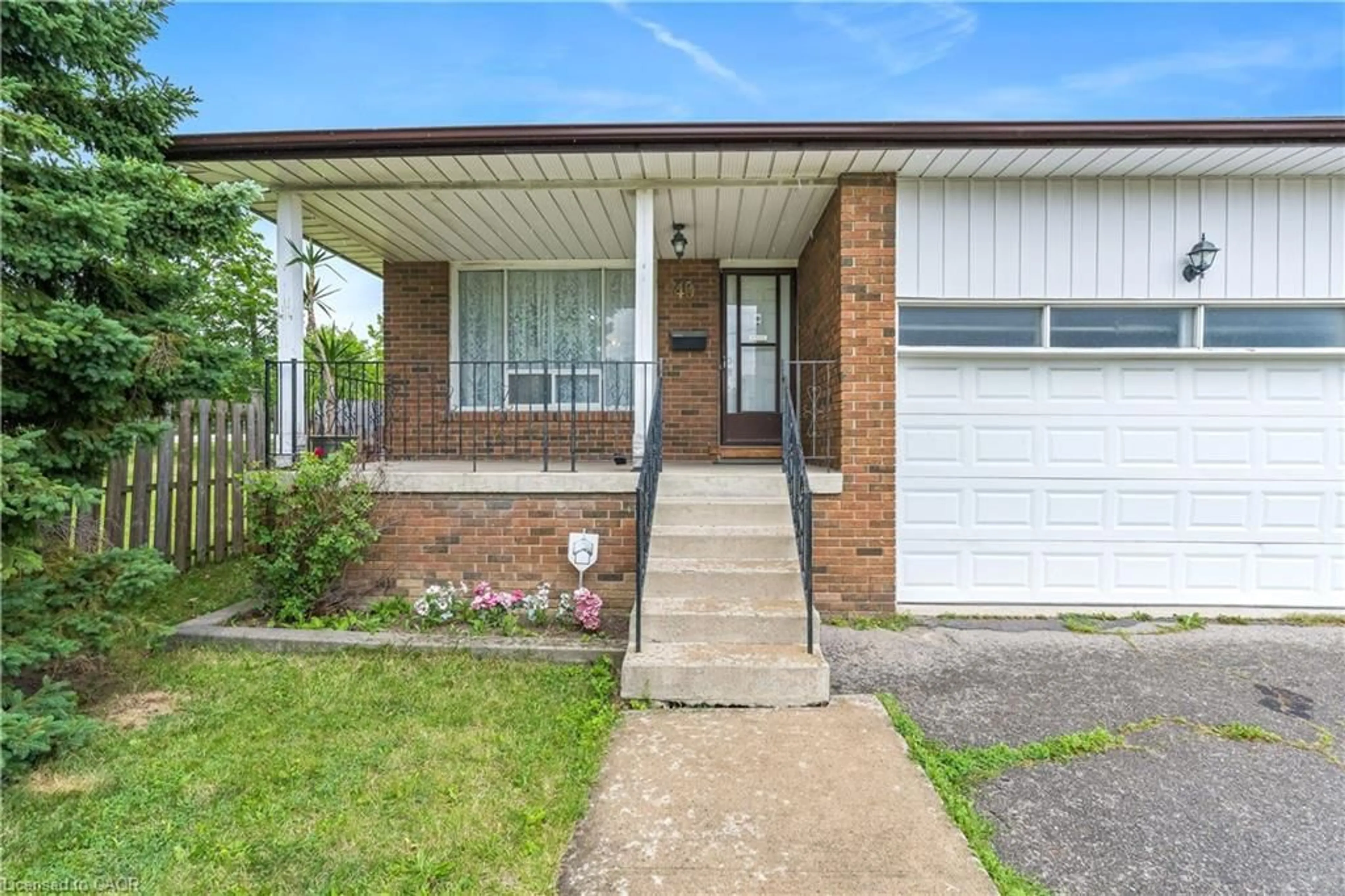 Home with brick exterior material, street for 49 Hull St, Malton Ontario L4T 1C4