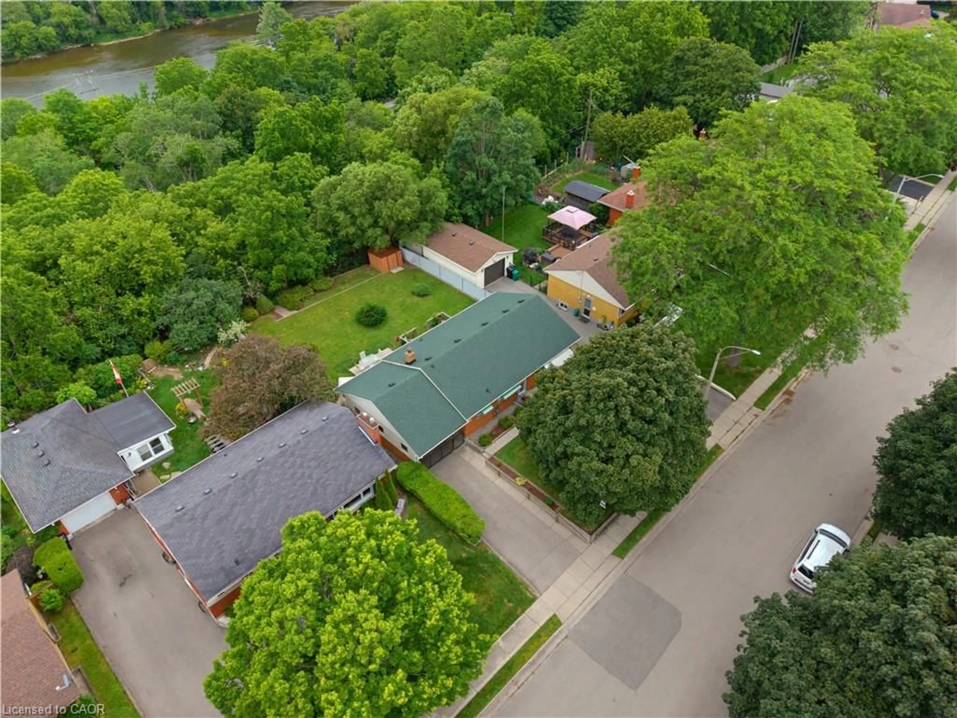 A pic from outside/outdoor area/front of a property/back of a property/a pic from drone, street for 42 Highman Ave, Cambridge Ontario N1R 3L7