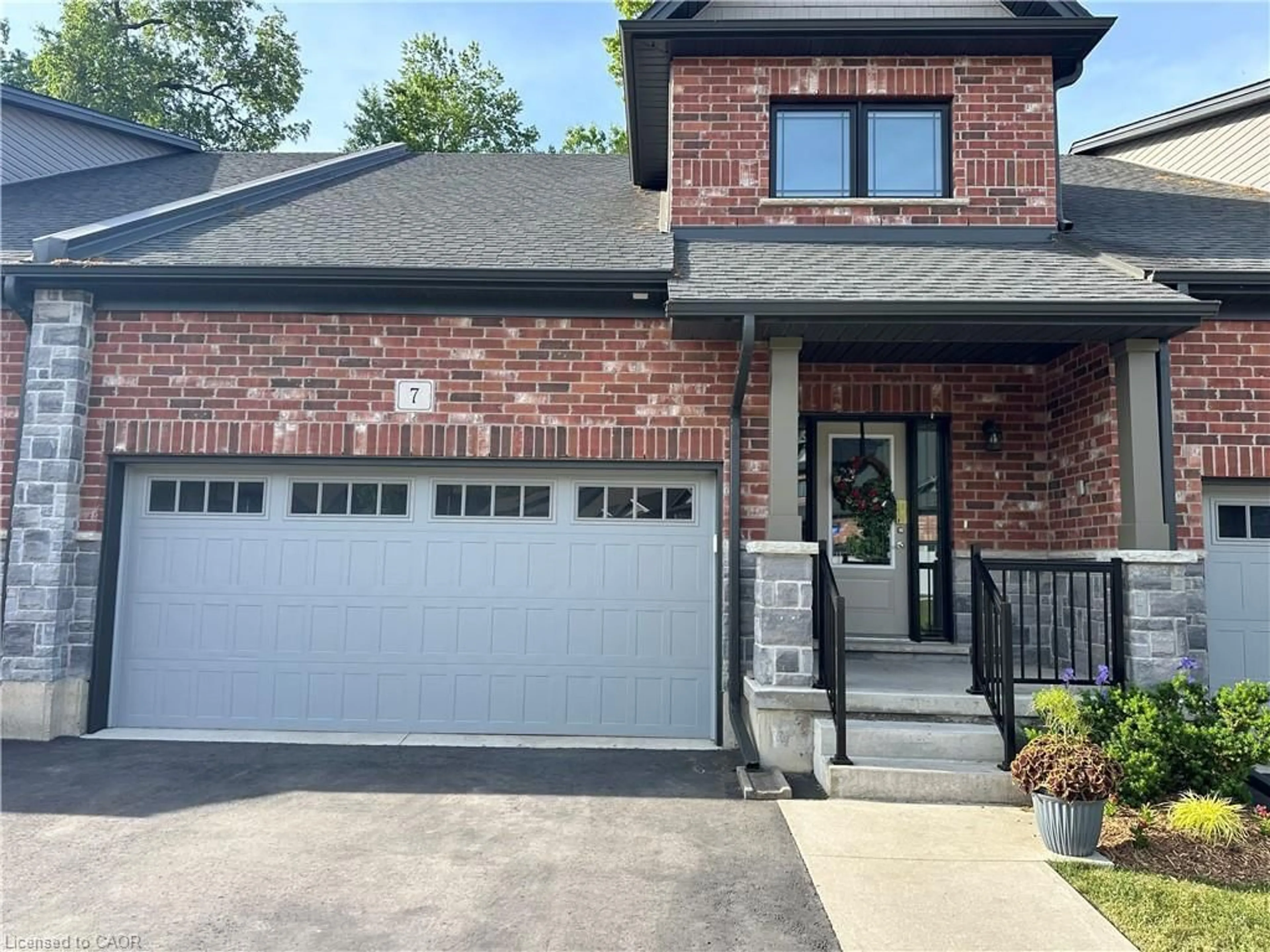 Home with brick exterior material, street for 7 Serviceberry Lane, Simcoe Ontario N3Y 0E7