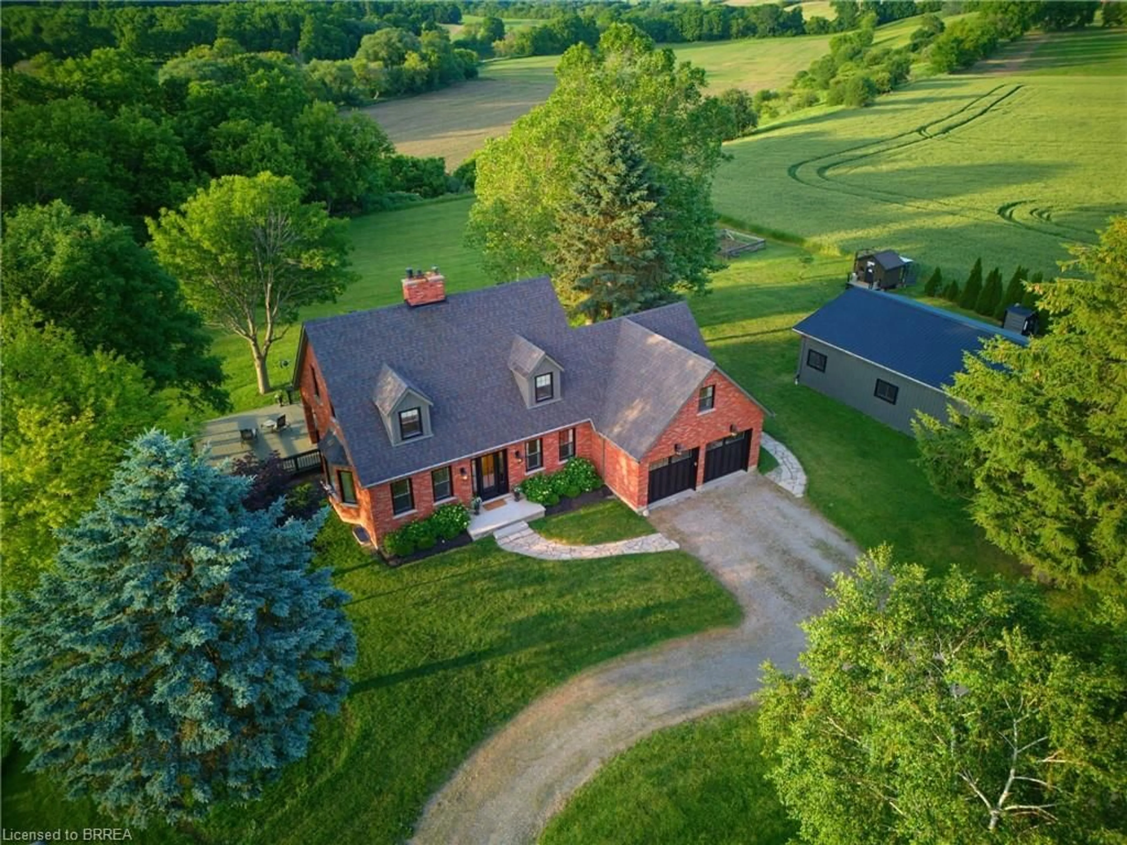 A pic from outside/outdoor area/front of a property/back of a property/a pic from drone, unknown for 99 County Road 18, Brantford Ontario N3T 5L9