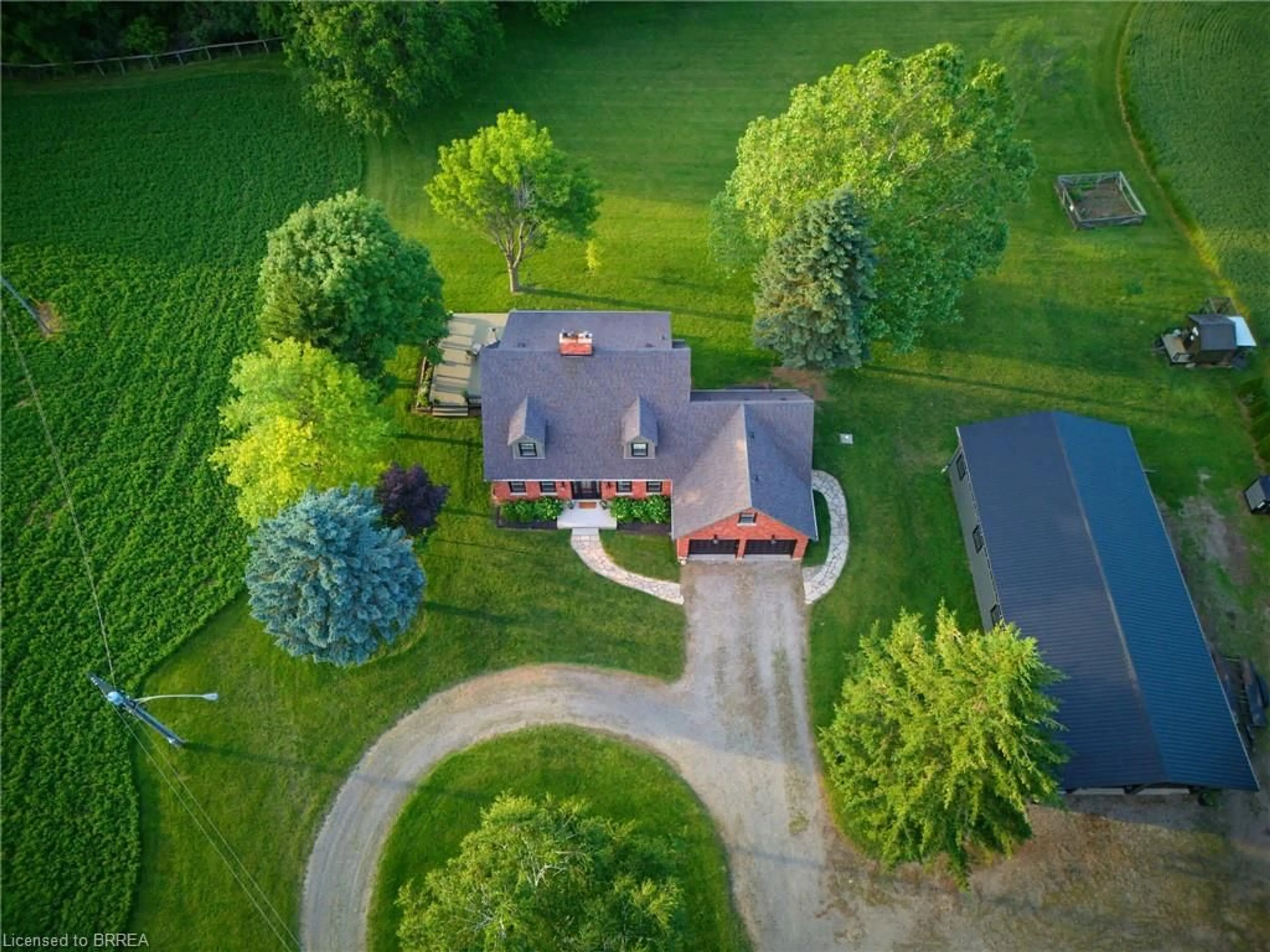 A pic from outside/outdoor area/front of a property/back of a property/a pic from drone, street for 99 County Road 18, Brantford Ontario N3T 5L9