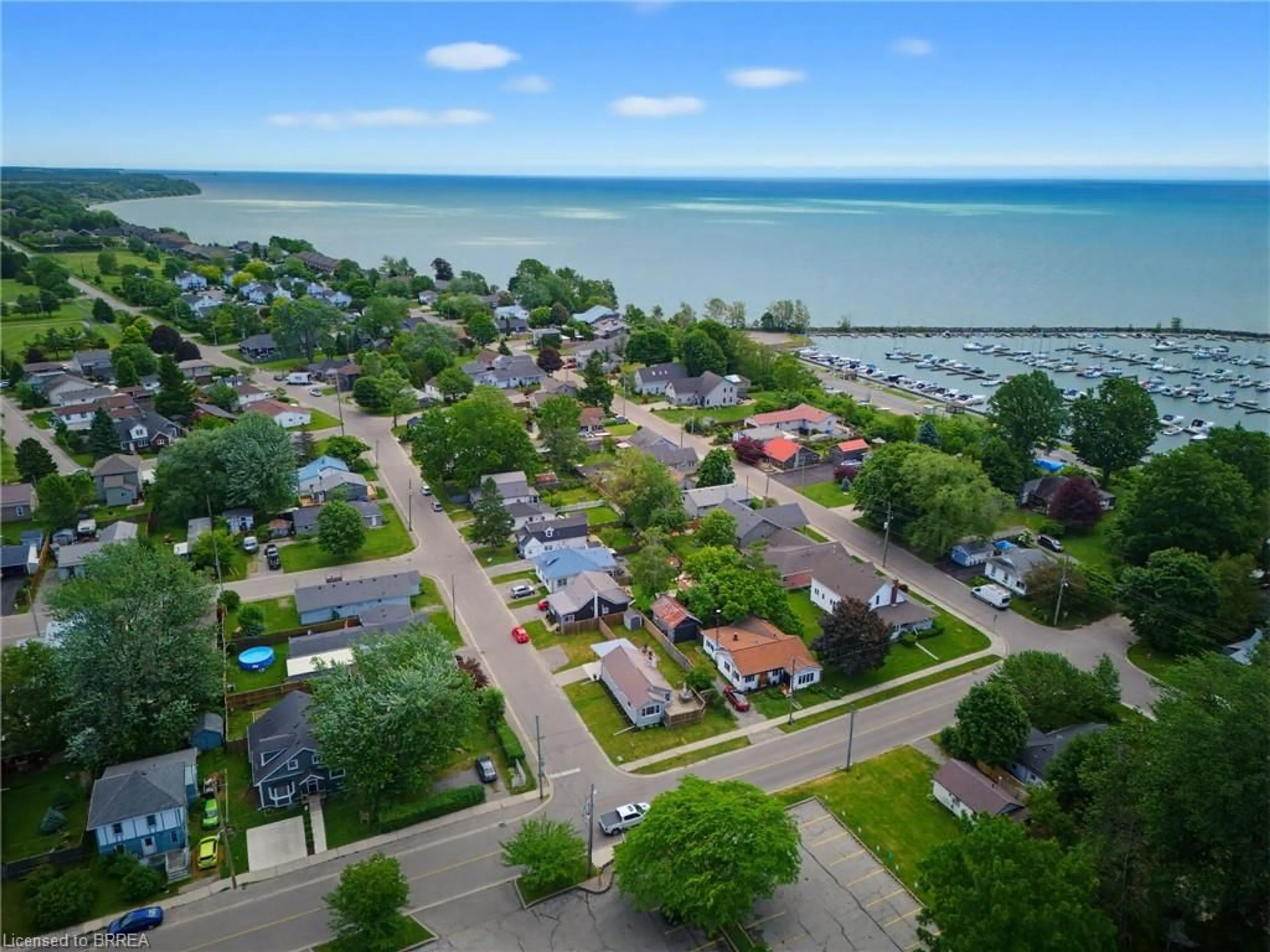 A pic from outside/outdoor area/front of a property/back of a property/a pic from drone, water/lake/river/ocean view for 23 John St, Port Dover Ontario N0A 1N7