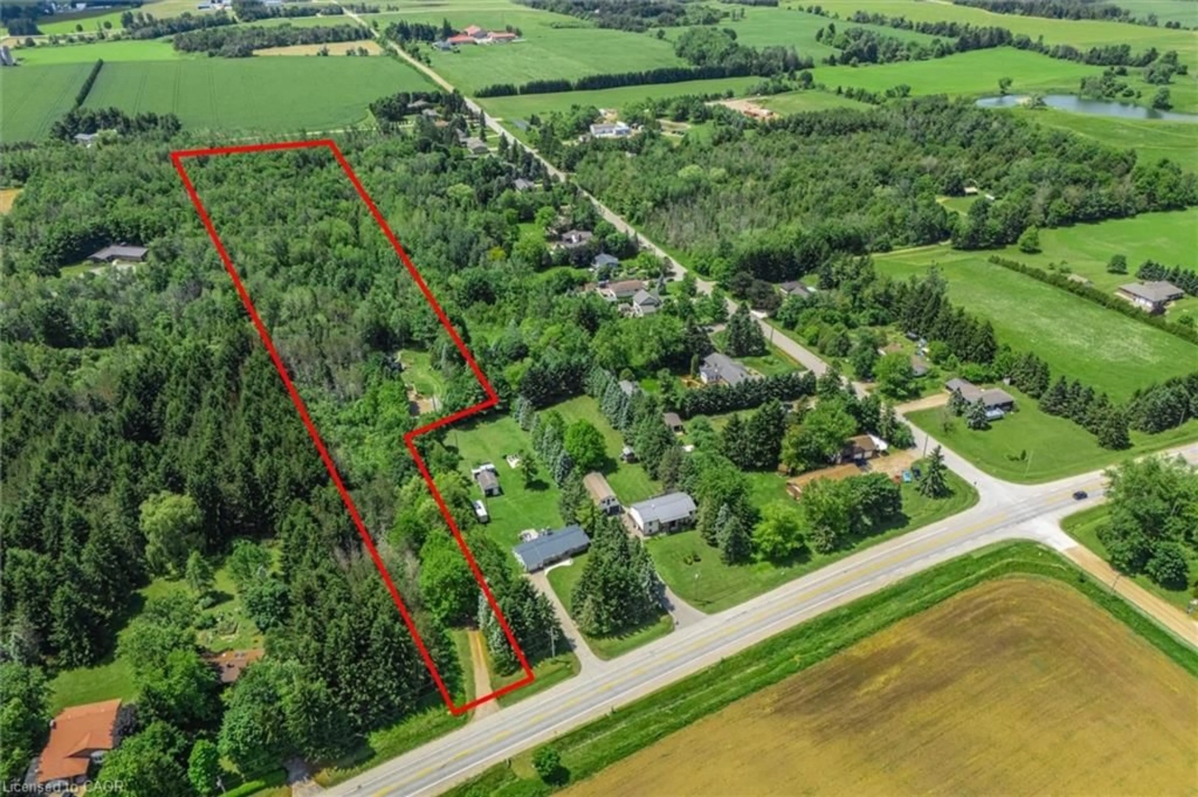 A pic from outside/outdoor area/front of a property/back of a property/a pic from drone, unknown for 7270 Wellington Road 7, Mapleton Ontario N0B 1A0