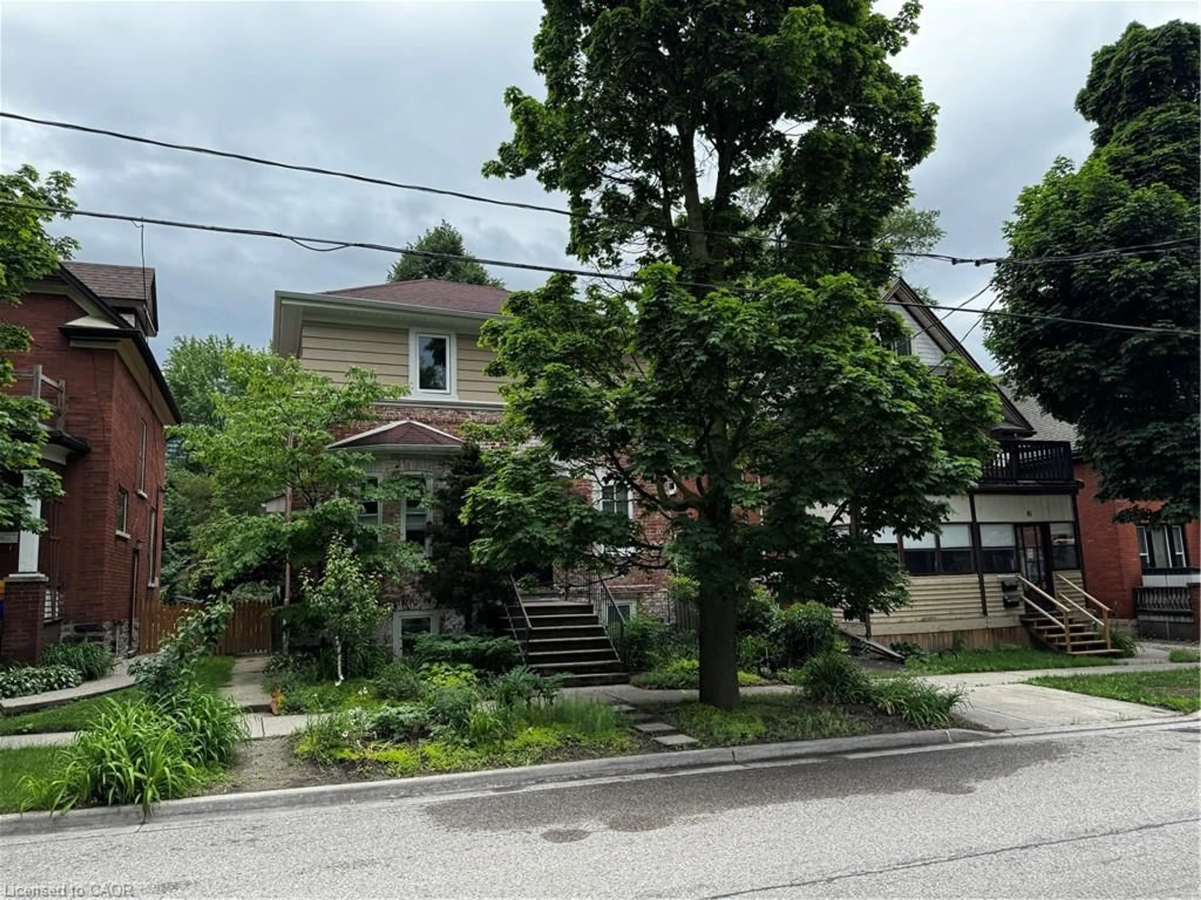 A pic from outside/outdoor area/front of a property/back of a property/a pic from drone, street for 83 Louisa St, Kitchener Ontario N2H 5L9
