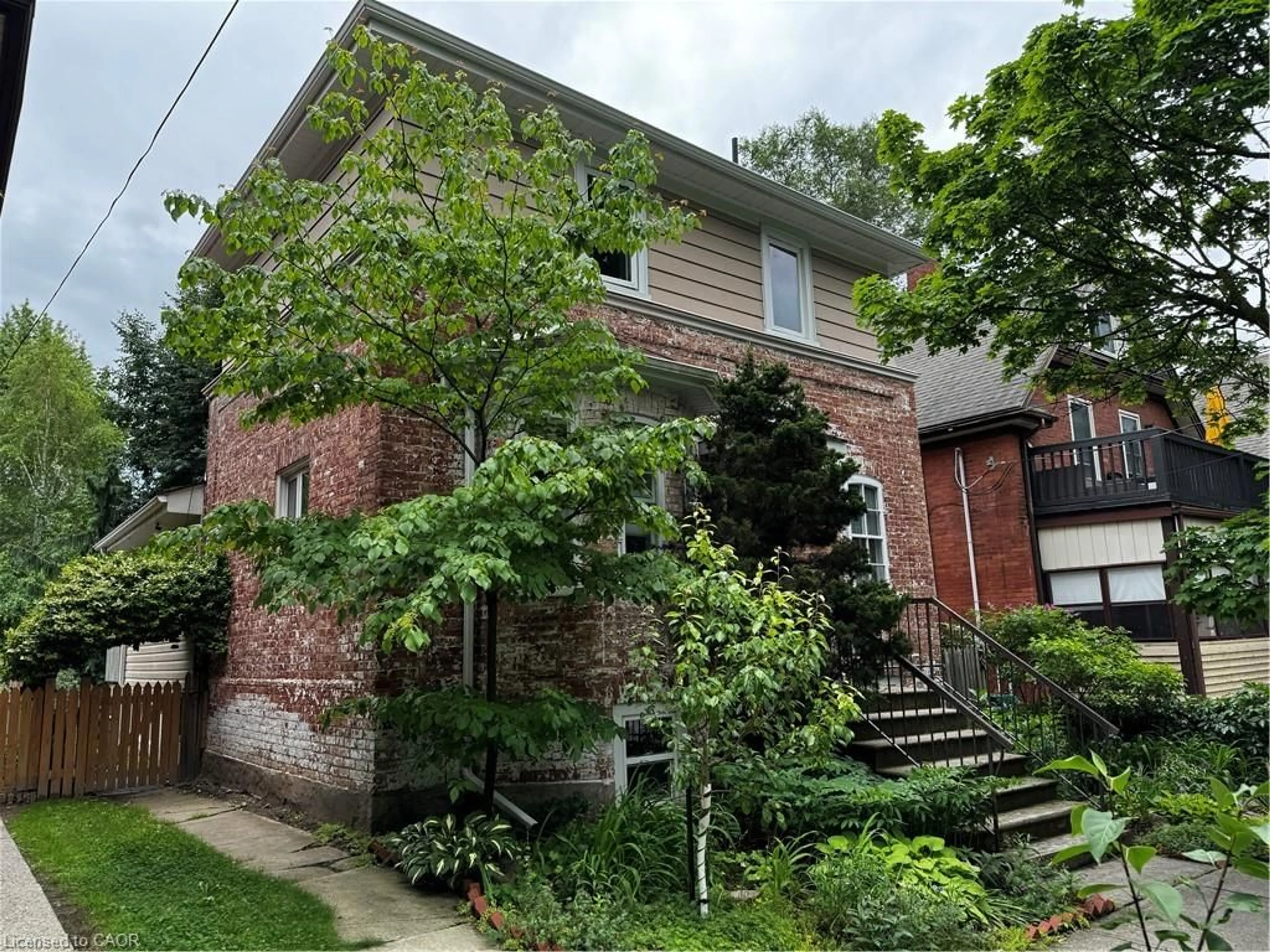 Home with brick exterior material, street for 83 Louisa St, Kitchener Ontario N2H 5L9