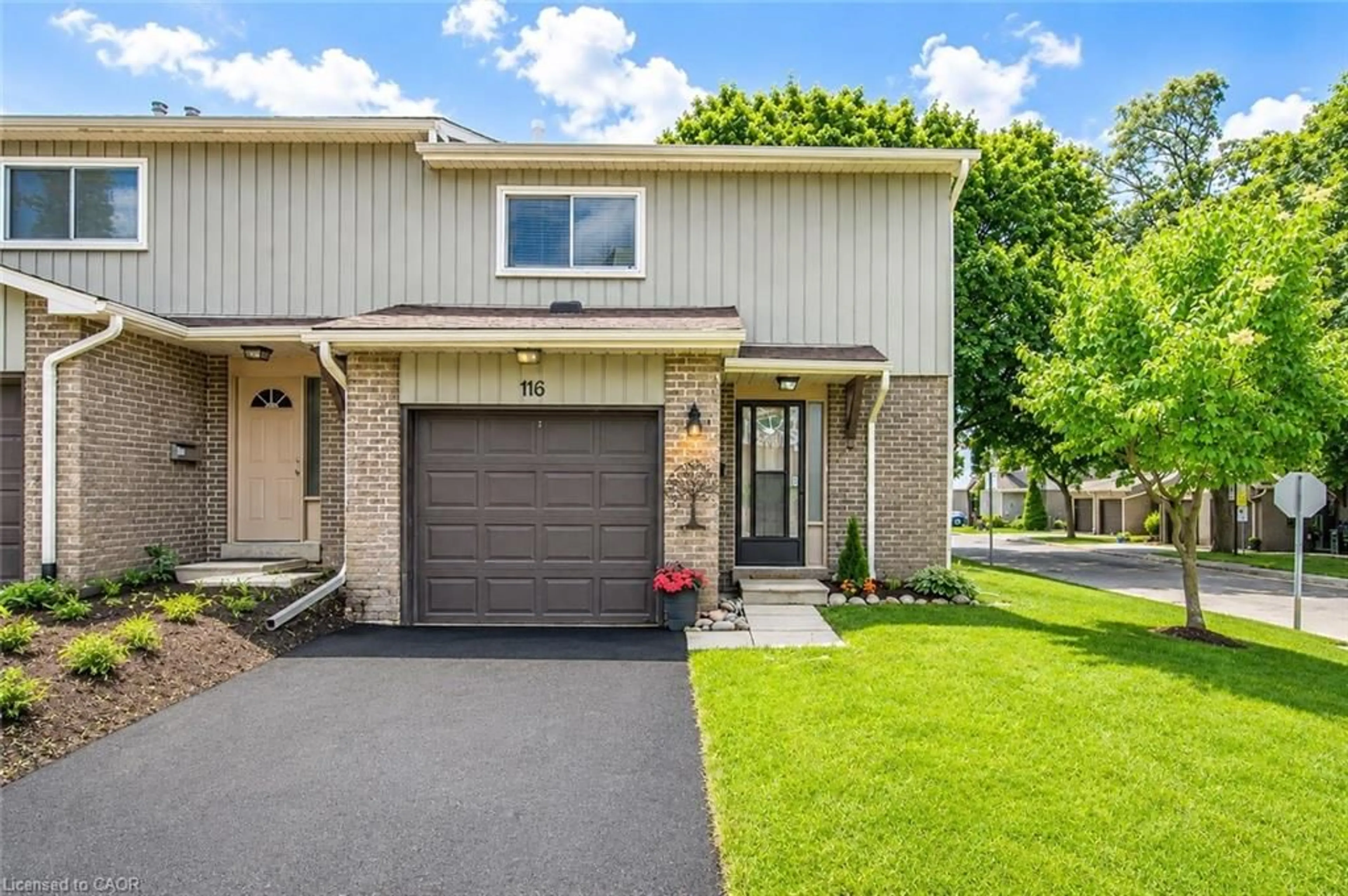 Home with vinyl exterior material, street for 51 Paulander Dr #116, Kitchener Ontario N2M 5E5