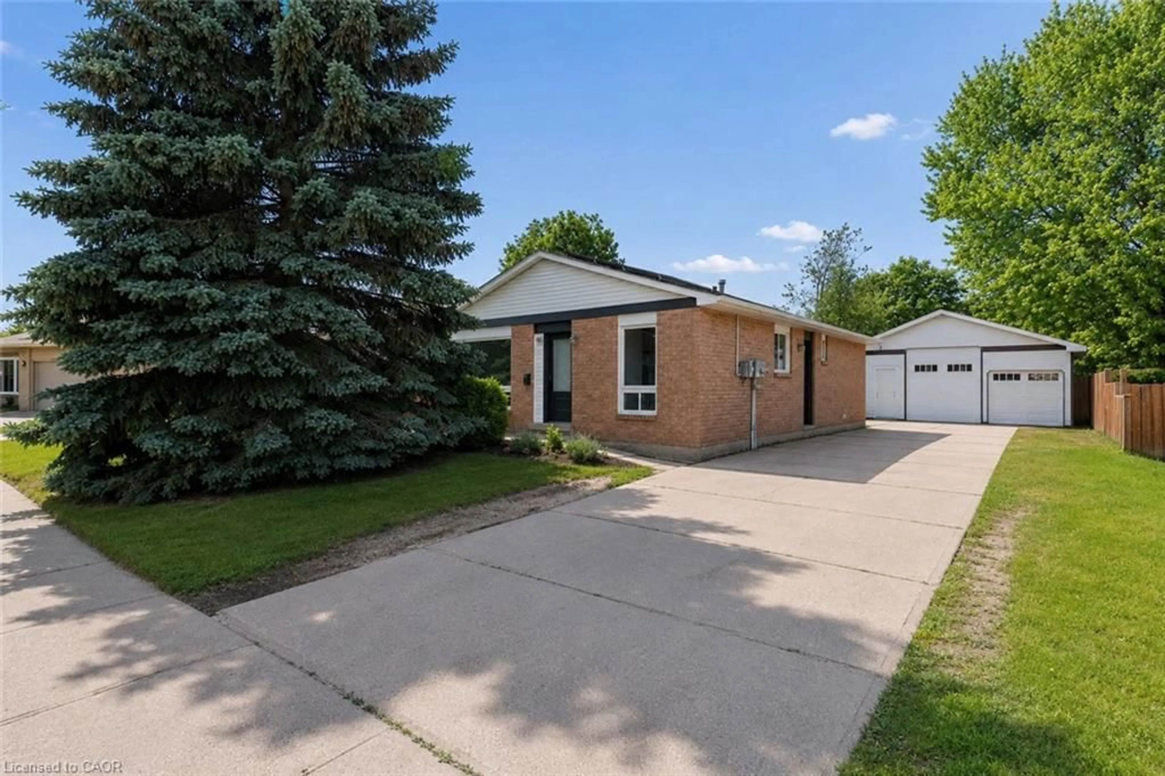 Home with brick exterior material, street for 96 Pathfinder Cres, Kitchener Ontario N2P 1S6