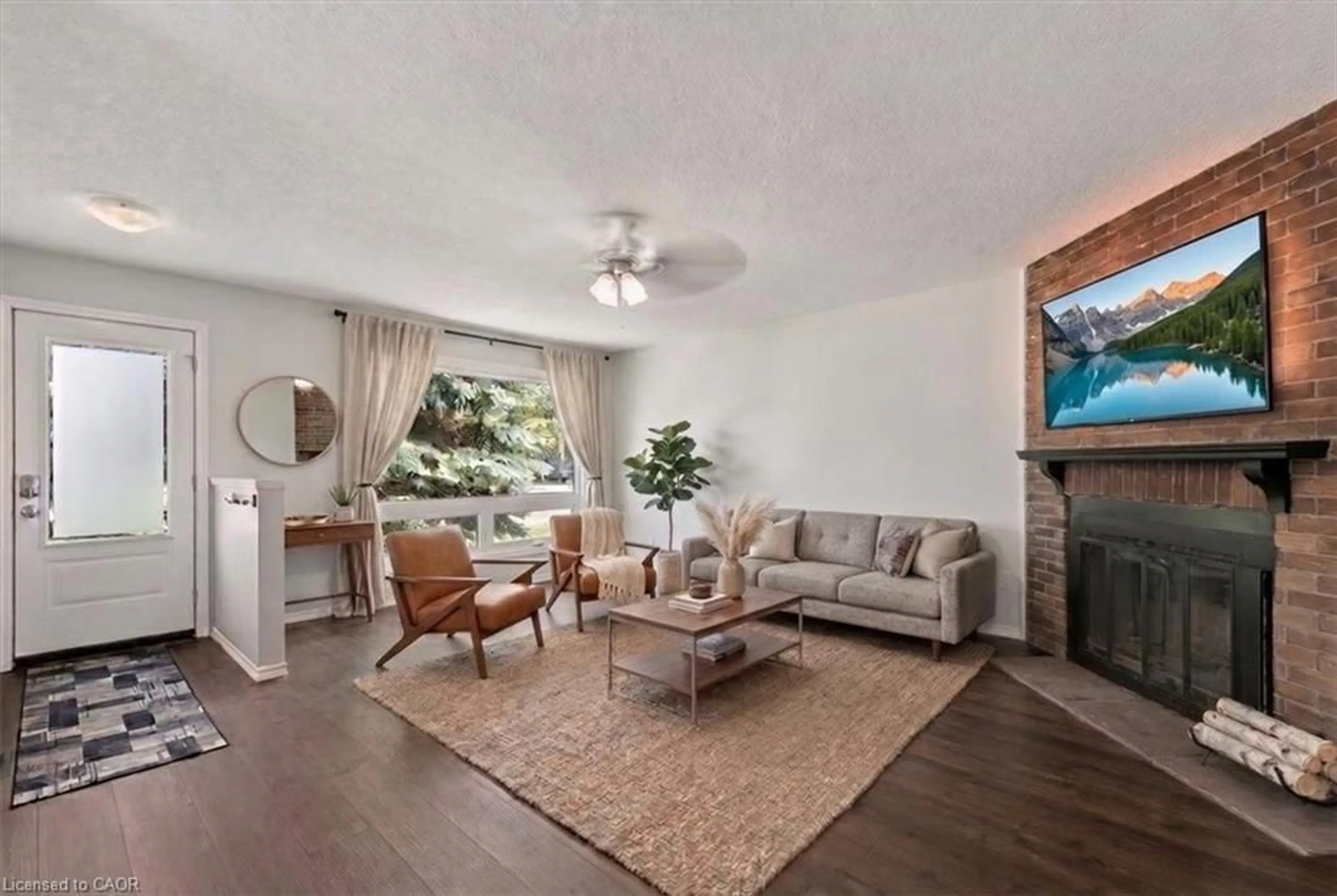 Living room with furniture, wood/laminate floor for 96 Pathfinder Cres, Kitchener Ontario N2P 1S6