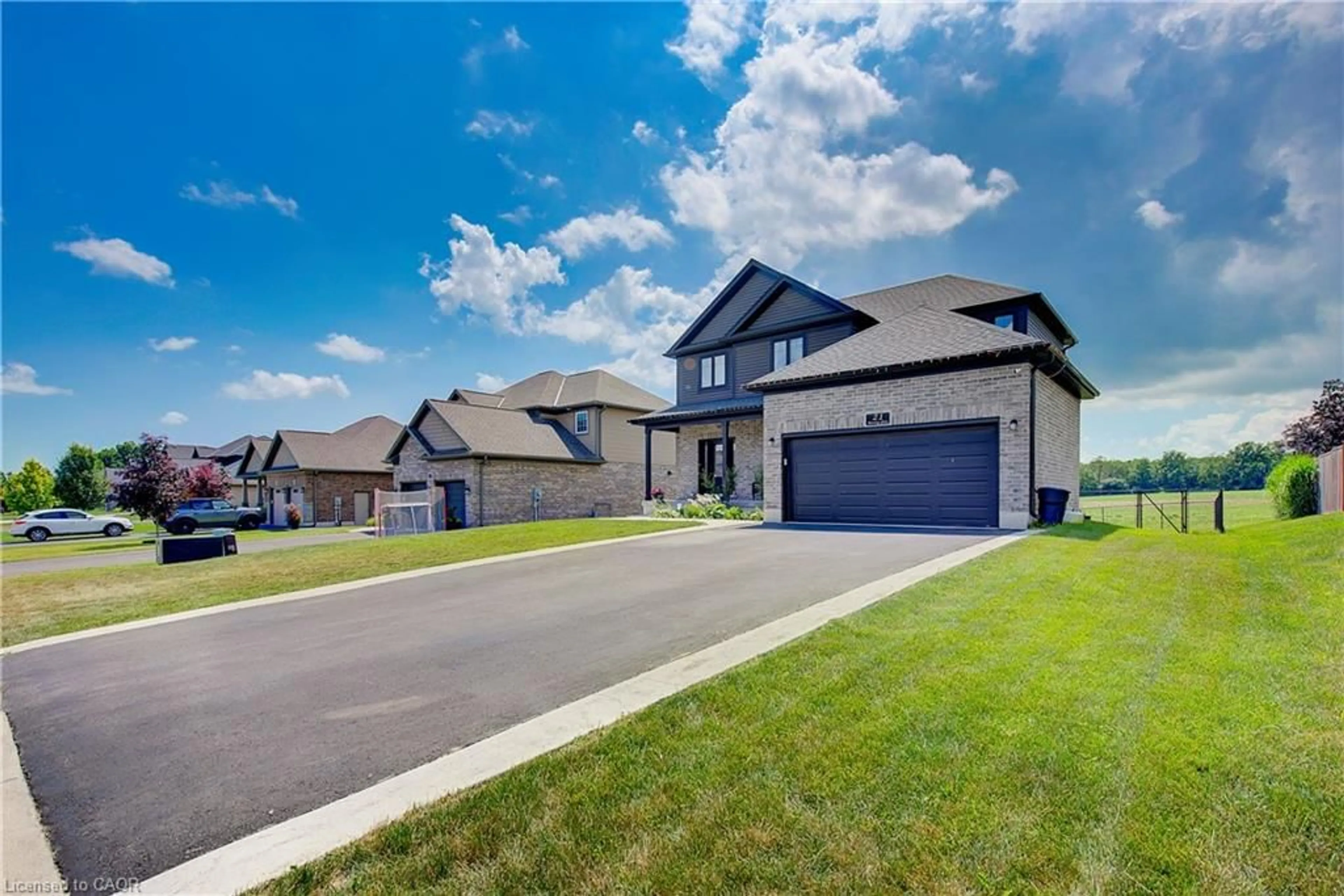 A pic from outside/outdoor area/front of a property/back of a property/a pic from drone, street for 21 Morning Glory Dr, Tillsonburg Ontario N4G 5S9