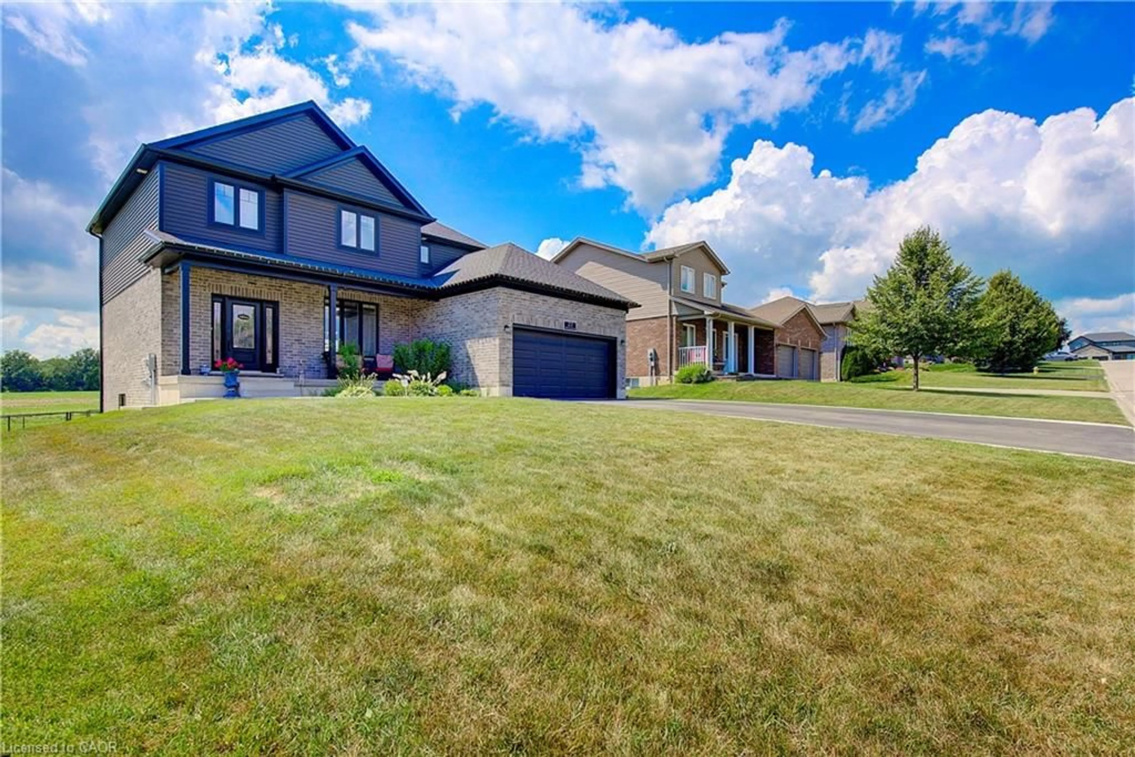 A pic from outside/outdoor area/front of a property/back of a property/a pic from drone, street for 21 Morning Glory Dr, Tillsonburg Ontario N4G 5S9
