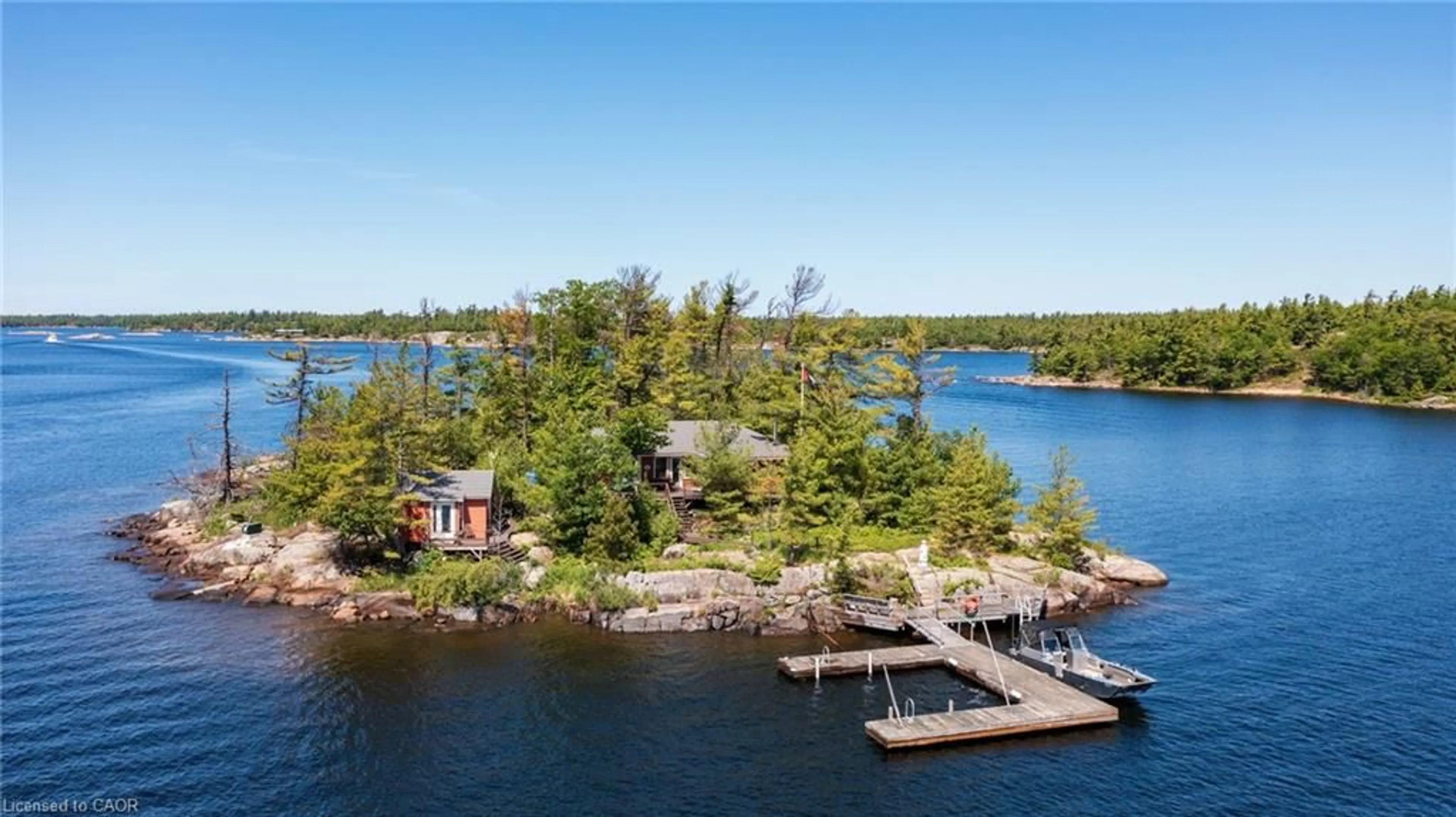 A pic from outside/outdoor area/front of a property/back of a property/a pic from drone, water/lake/river/ocean view for 1 B254 Island, The Archipelago Ontario P0C 1H0