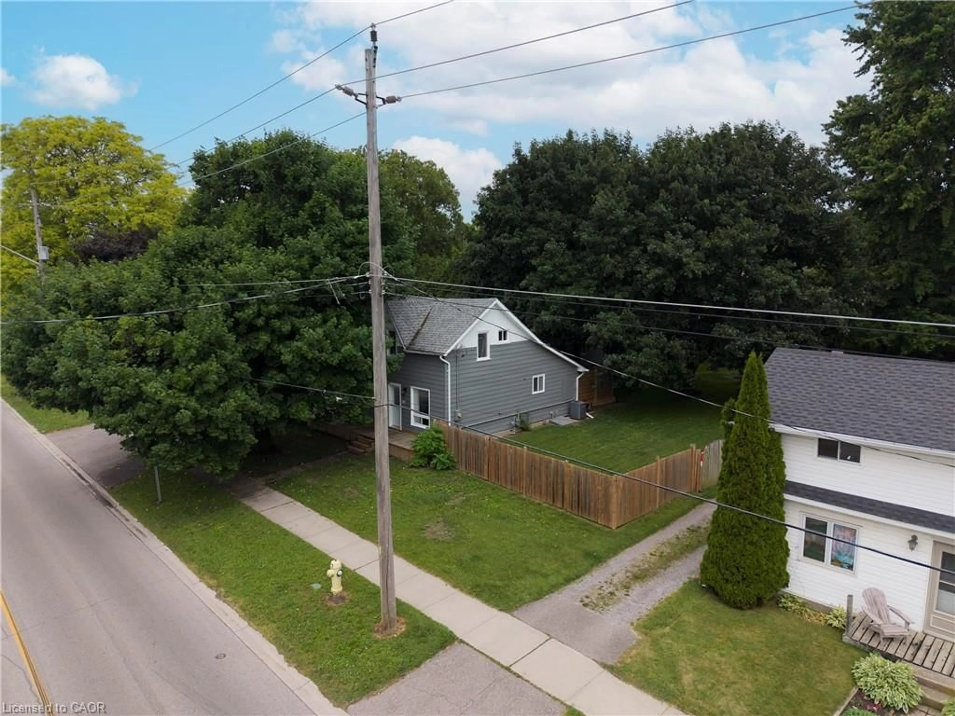 A pic from outside/outdoor area/front of a property/back of a property/a pic from drone, street for 97 Mechanic St, Waterford Ontario N0E 1Y0
