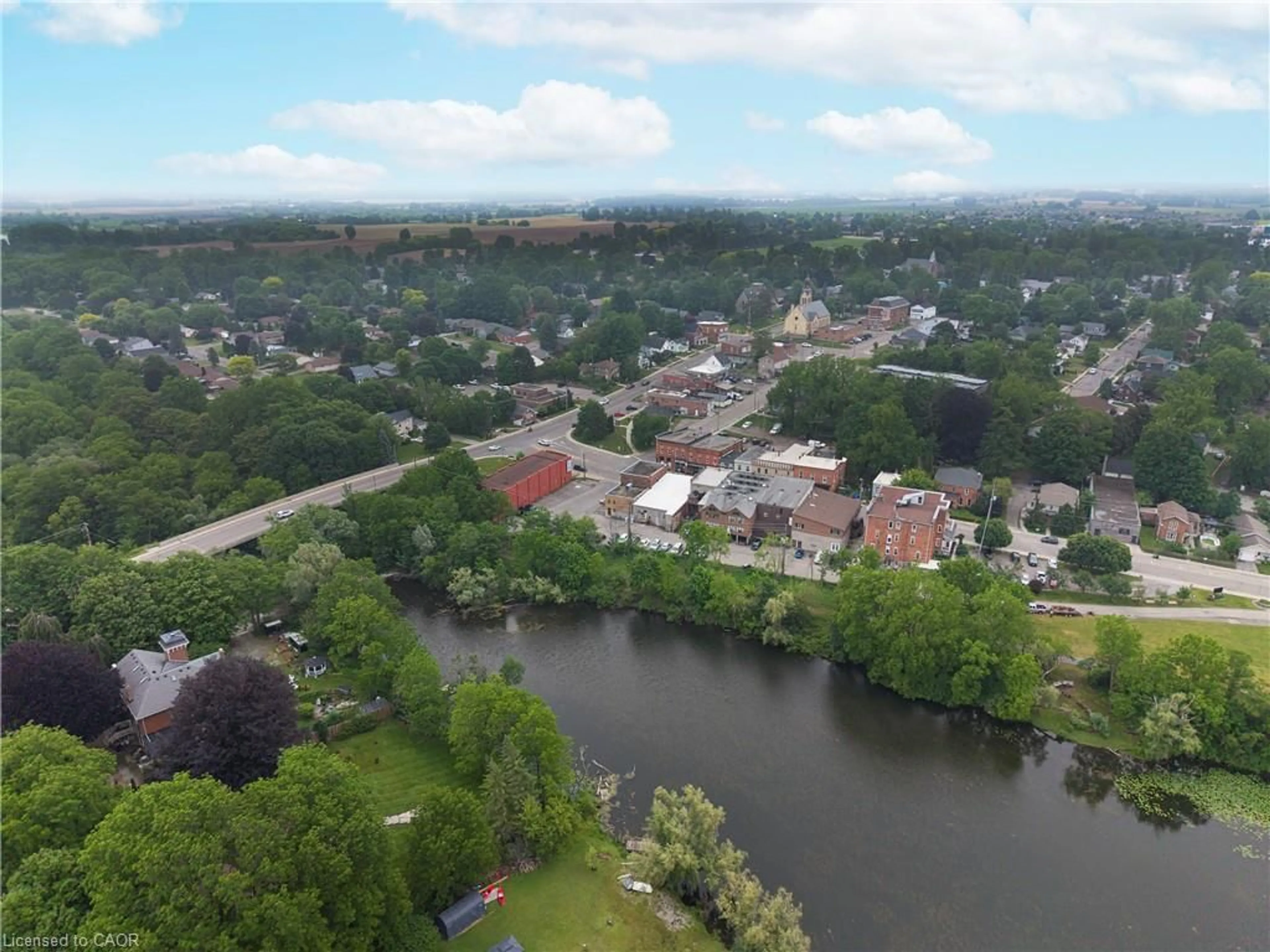 A pic from outside/outdoor area/front of a property/back of a property/a pic from drone, water/lake/river/ocean view for 97 Mechanic St, Waterford Ontario N0E 1Y0