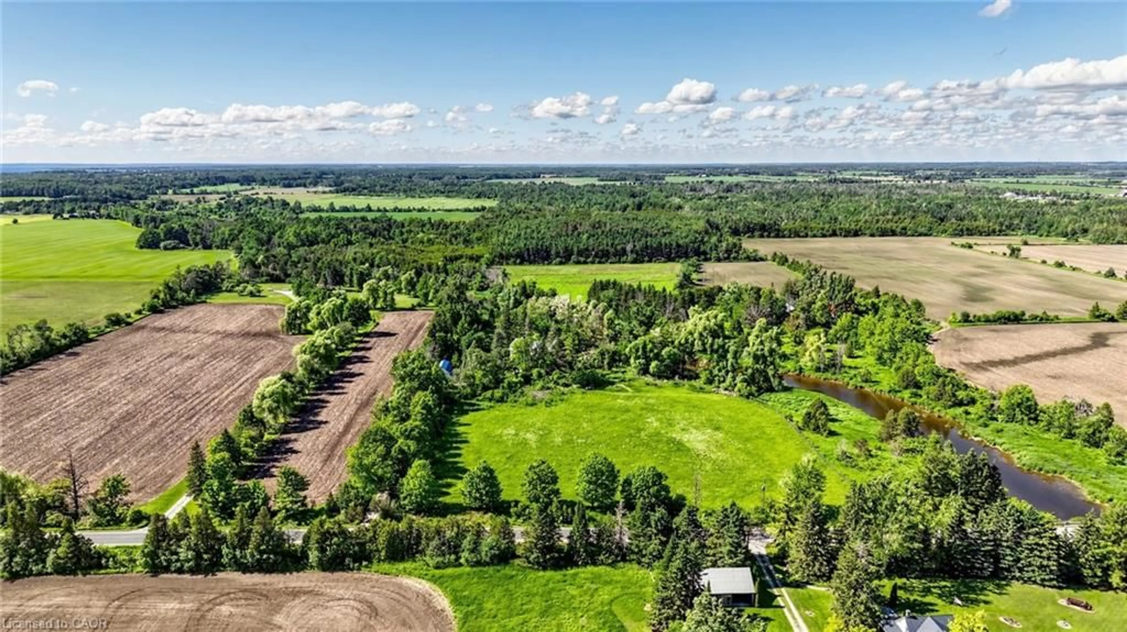 A pic from outside/outdoor area/front of a property/back of a property/a pic from drone, forest/trees view for 1745 Concession Rd 3 Rd, Beaverton Ontario L0K 1A0