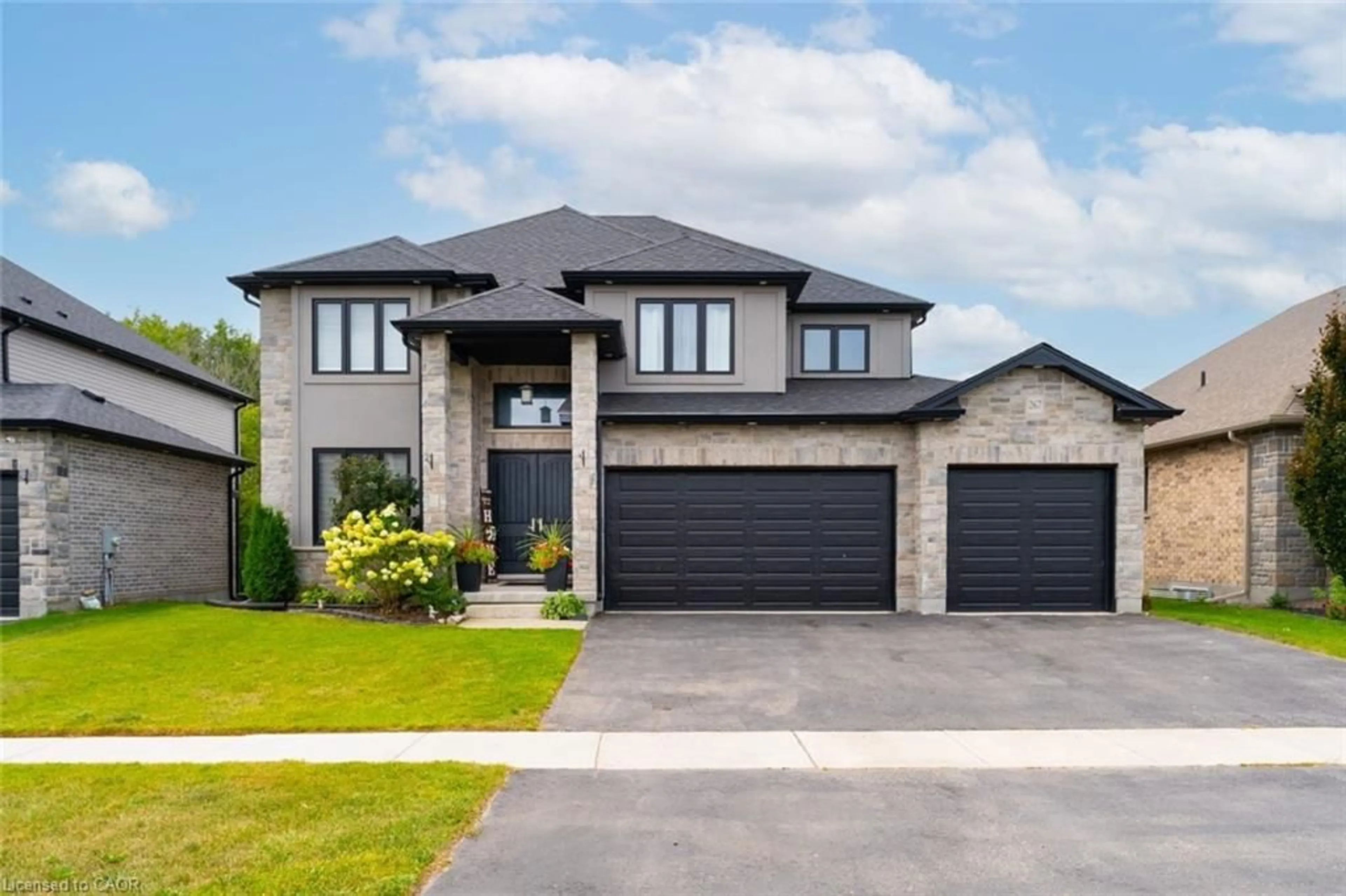 Home with brick exterior material, street for 267 Wedgewood Dr, Woodstock Ontario N4T 0J1