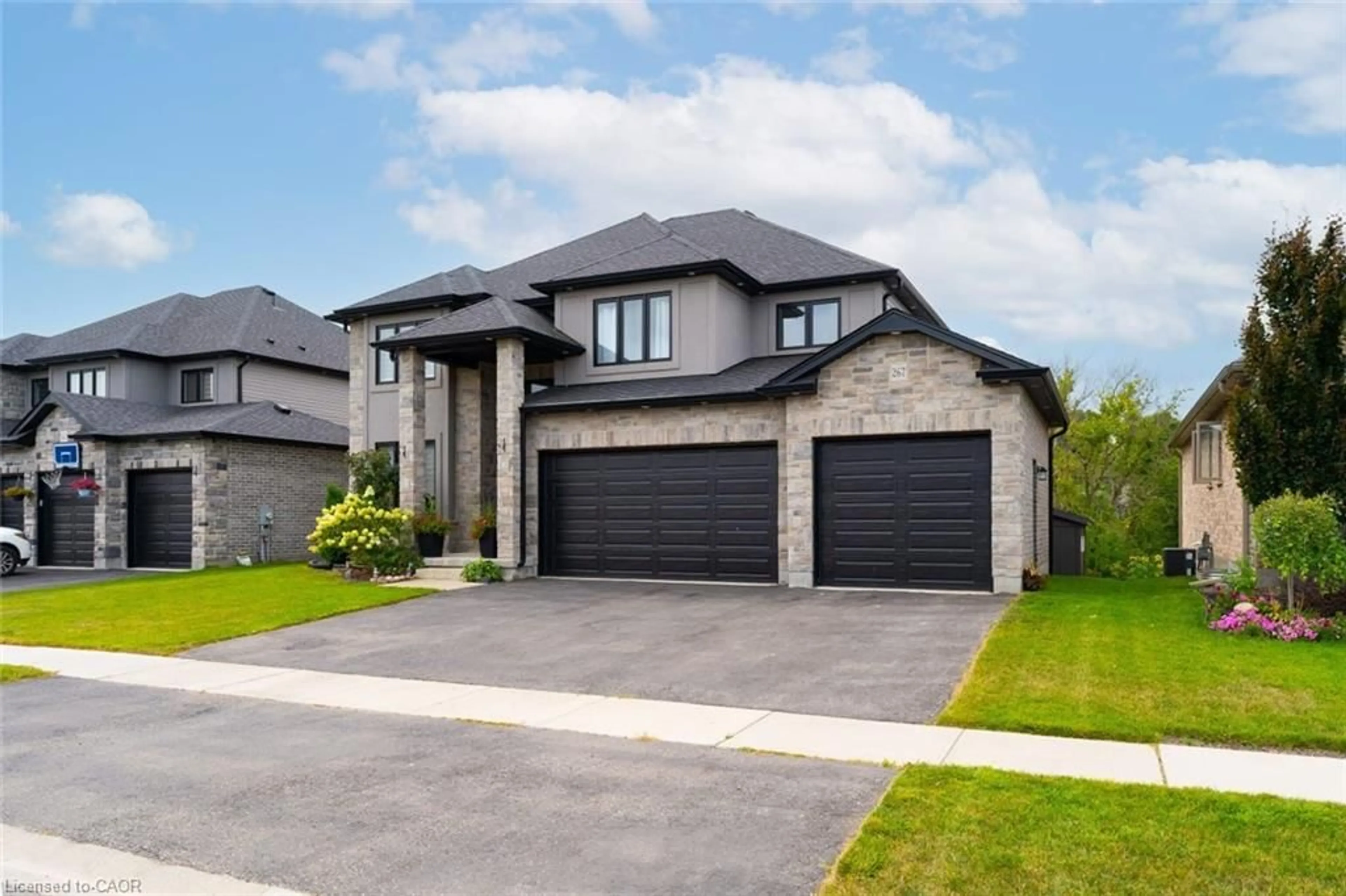 Home with brick exterior material, street for 267 Wedgewood Dr, Woodstock Ontario N4T 0J1
