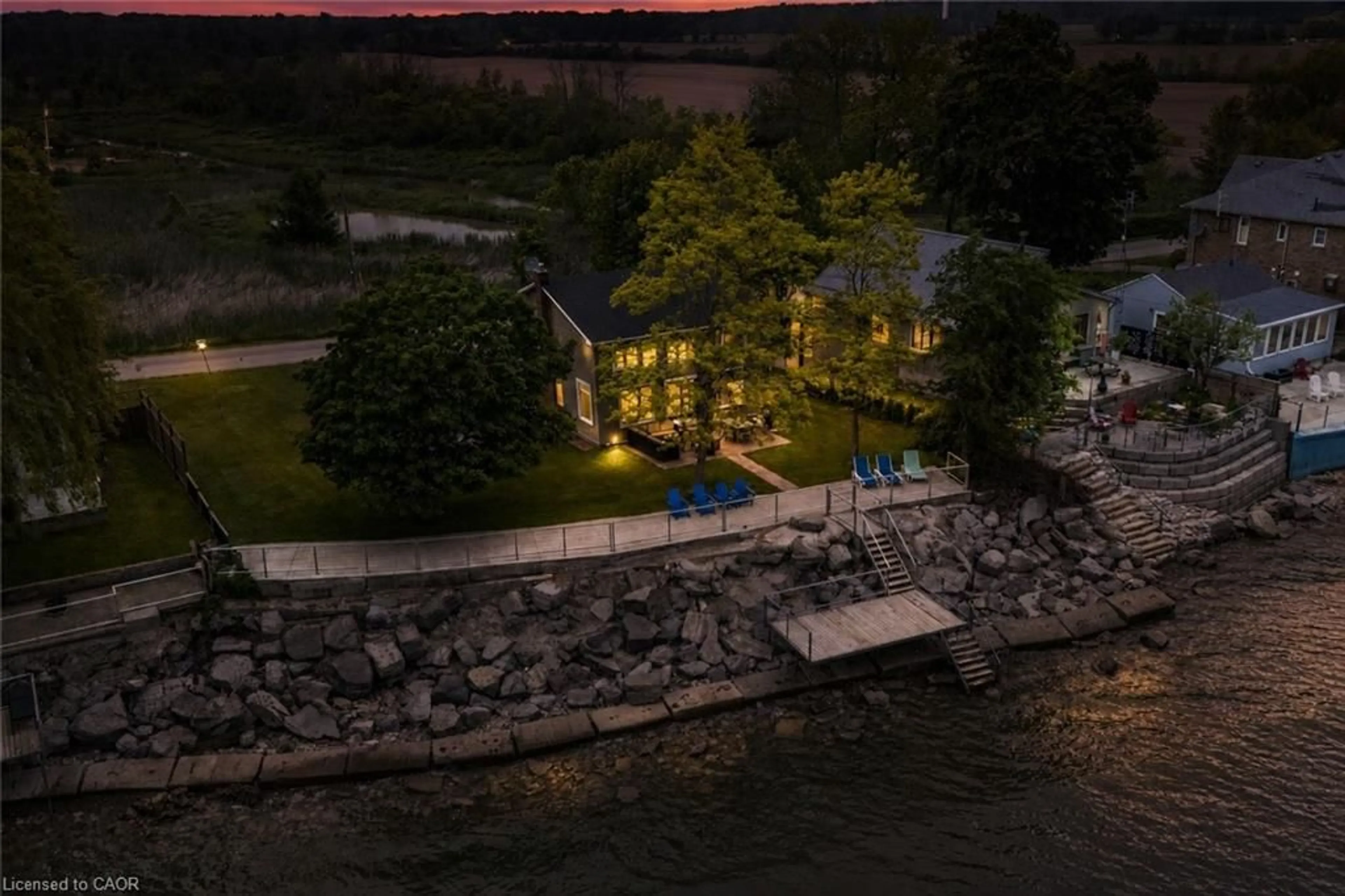 A pic from outside/outdoor area/front of a property/back of a property/a pic from drone, water/lake/river/ocean view for 2118 Lakeshore Rd, Dunnville Ontario N1A 2W8