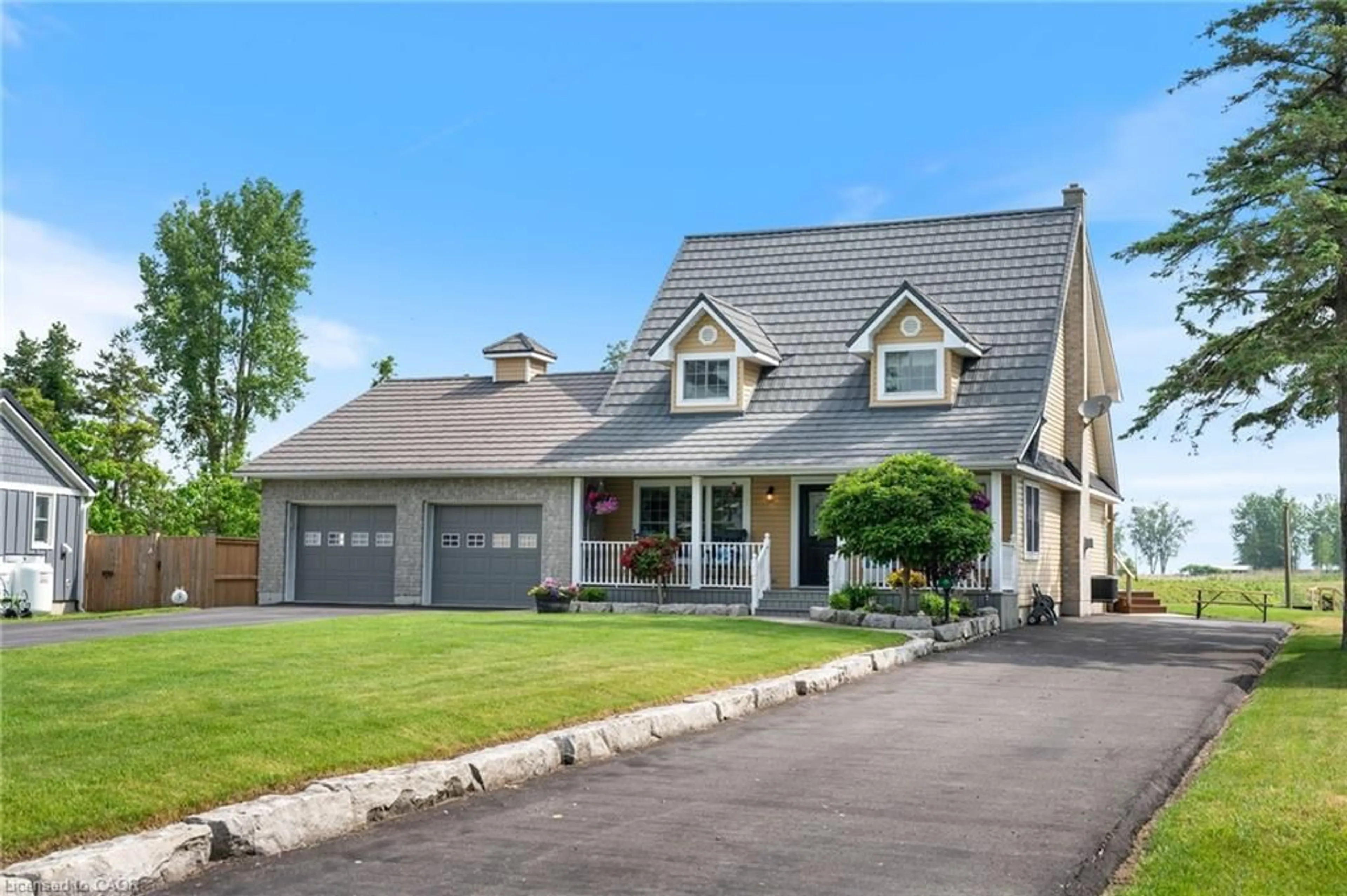 Home with vinyl exterior material, street for 43 Old Cut Blvd, Long Point Ontario N0E 1M0